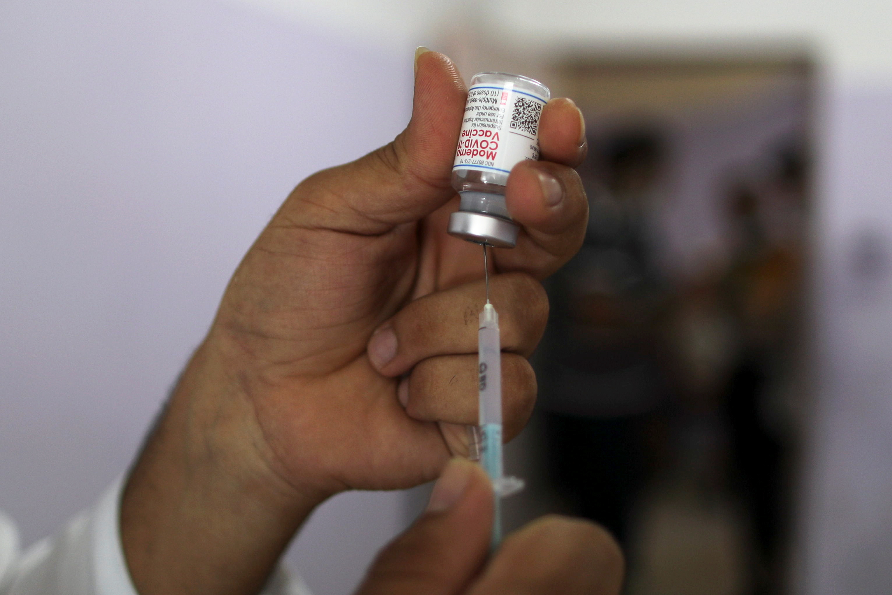Palestinians get vaccinated against COVID-19 in Gaza