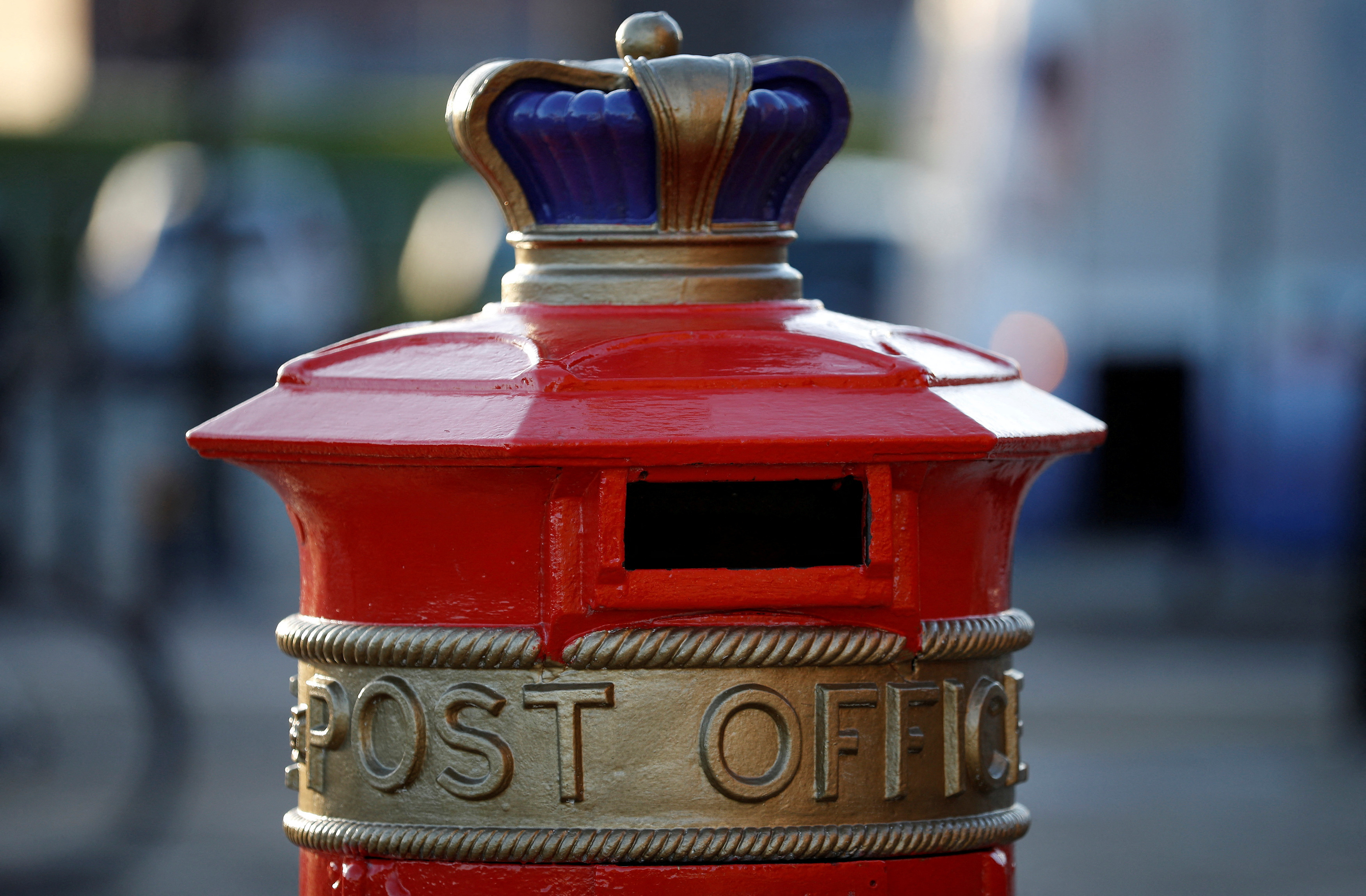 An ornate Royal Mail post box with Post Office written on it in Liverpool