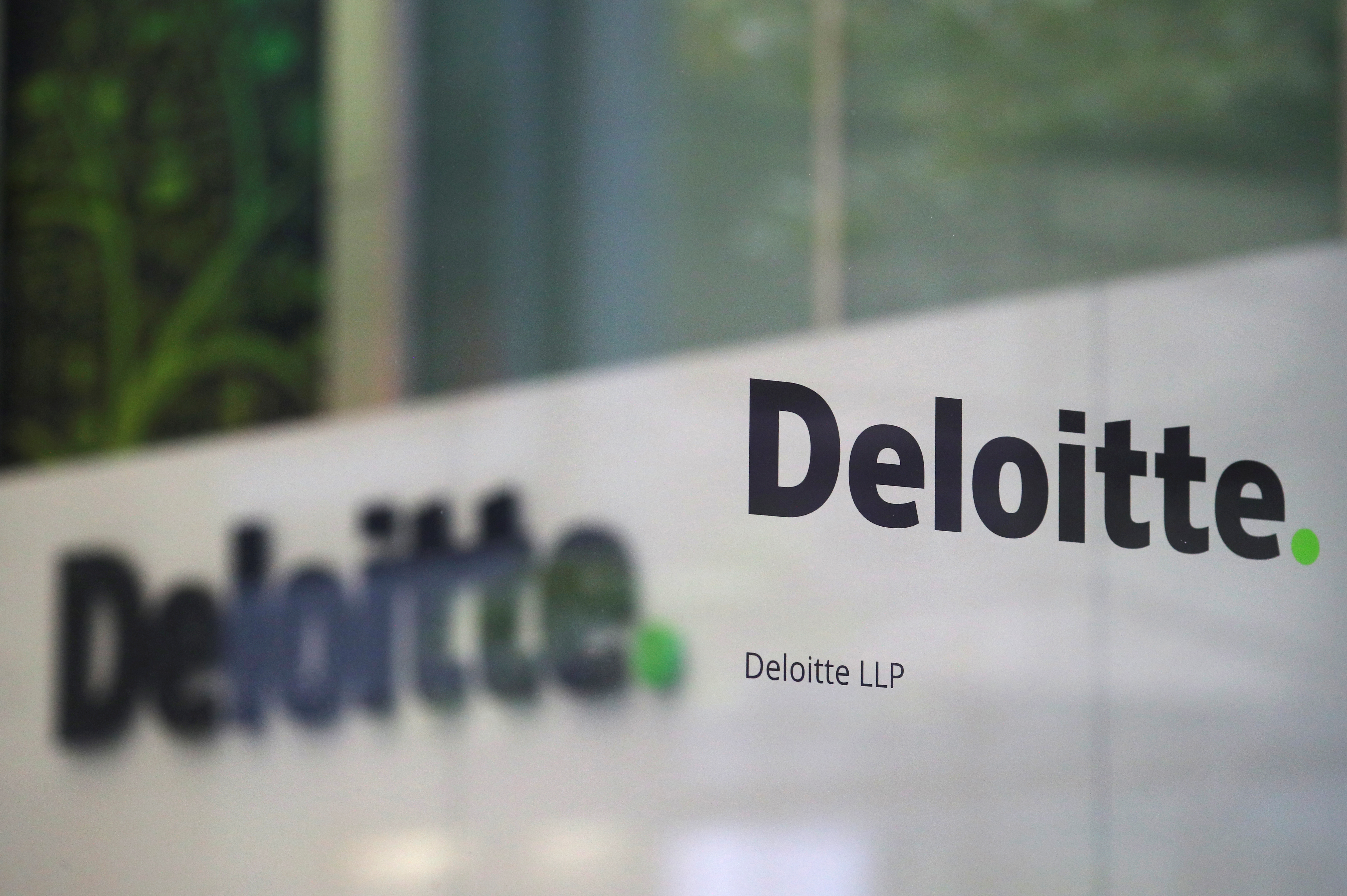 Offices of Deloitte are seen in London