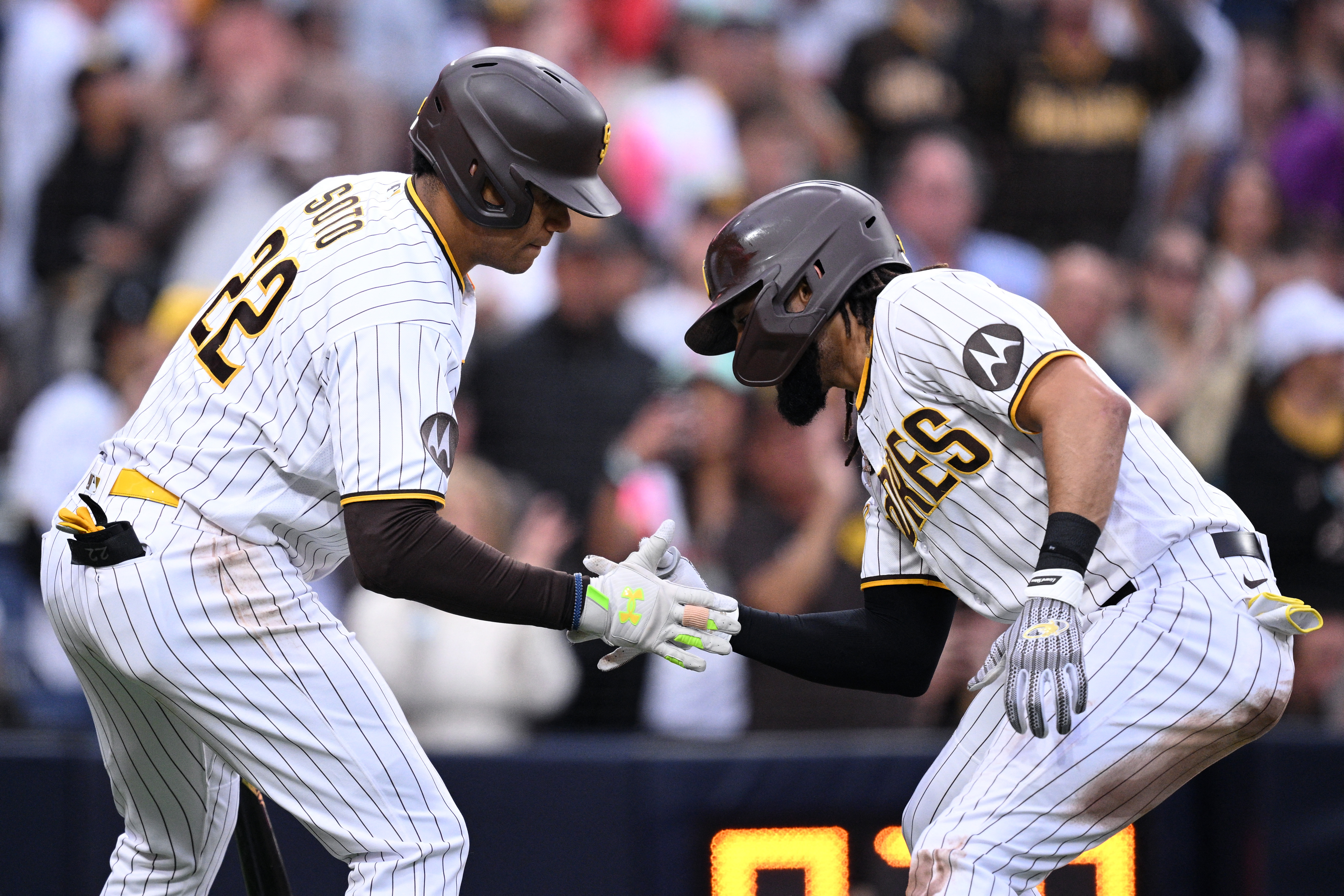 Machado's 2 home runs carry the Padres to a 4-2 win against the Cardinals, World