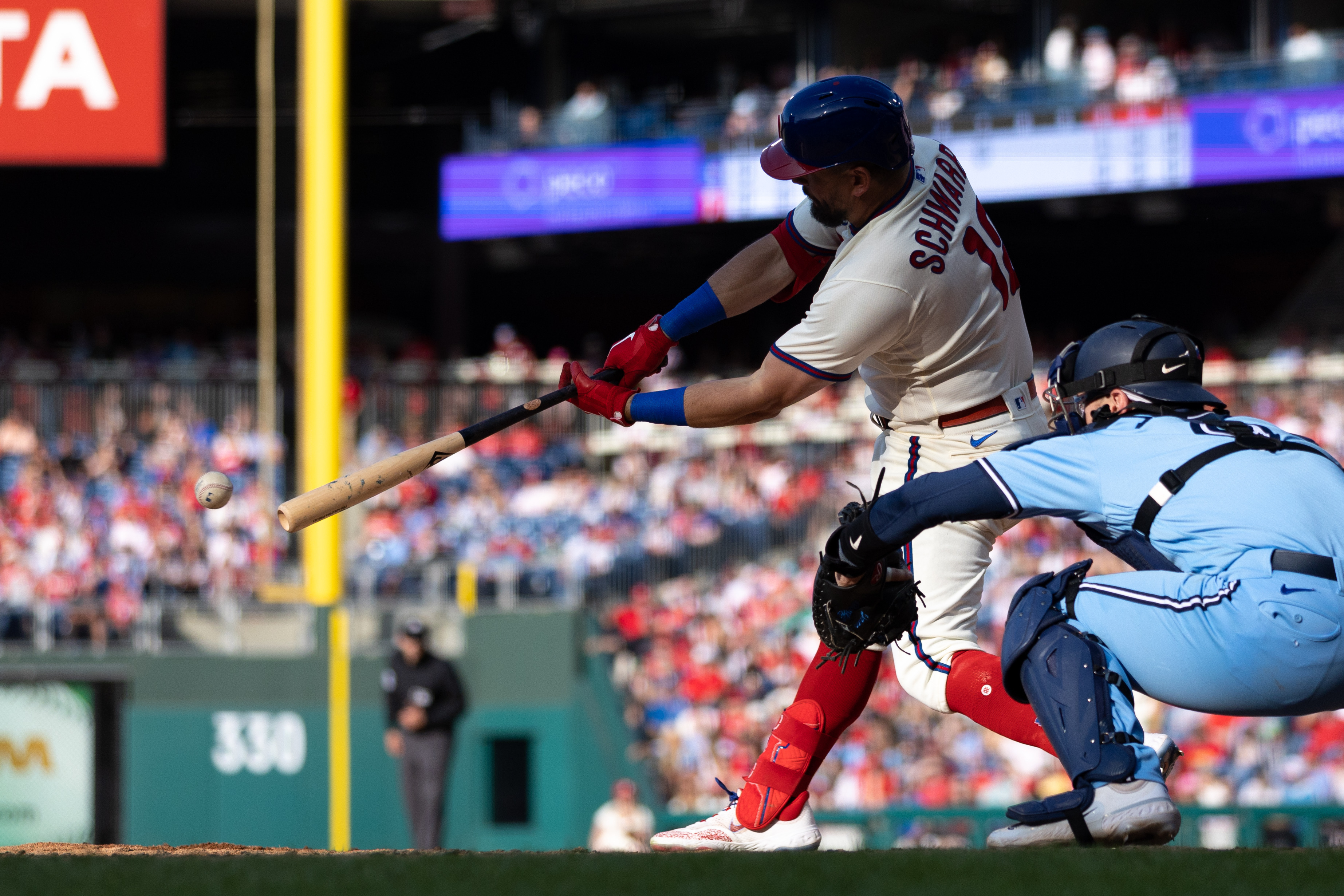 Phillies squeak by Blue Jays in 10 innings thanks to error
