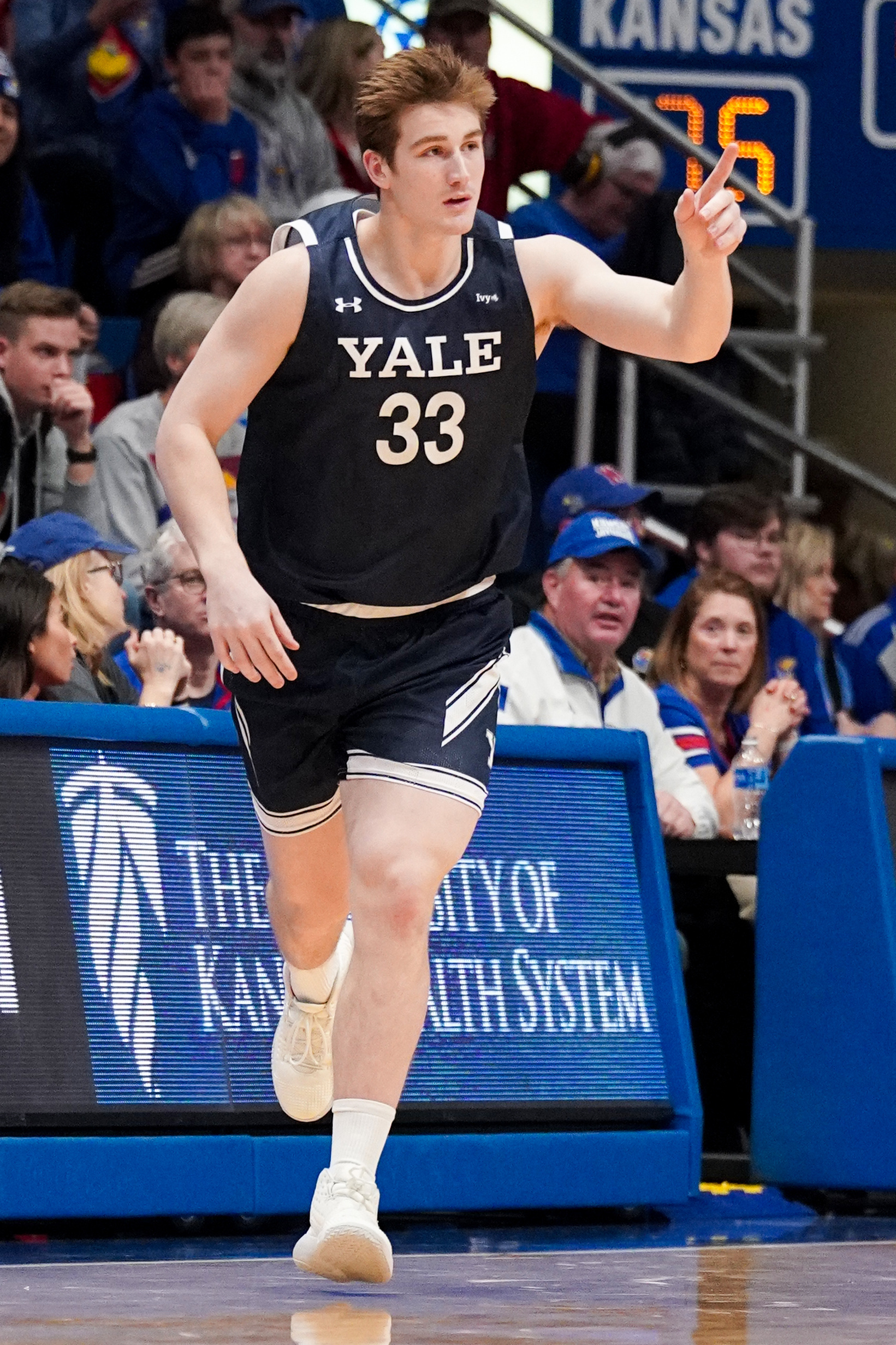 Kevin McCullar (34 Points) Helps No. 2 Kansas Escape Pesky Yale | Reuters