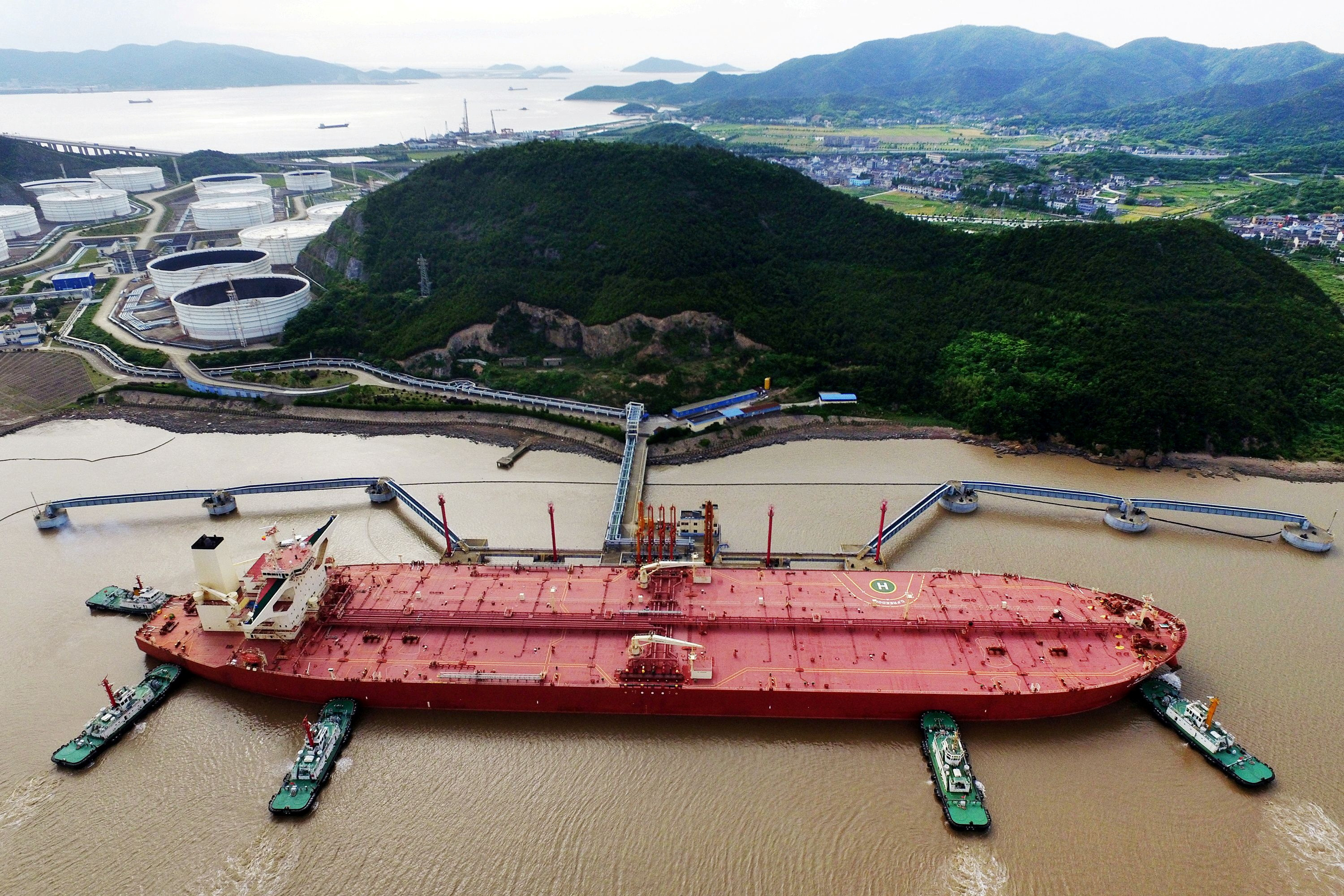 Oil tanker is seen at a crude oil terminal in Ningbo Zhoushan port