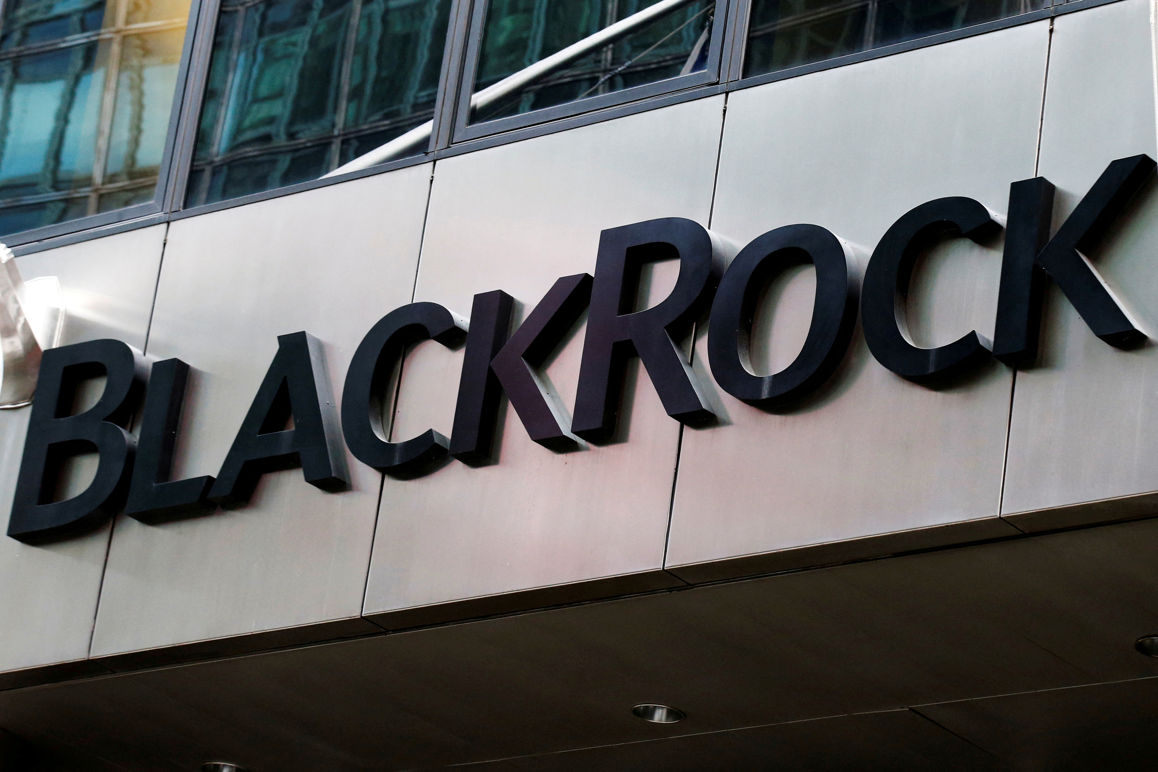 The BlackRock logo is seen outside of its offices in New York