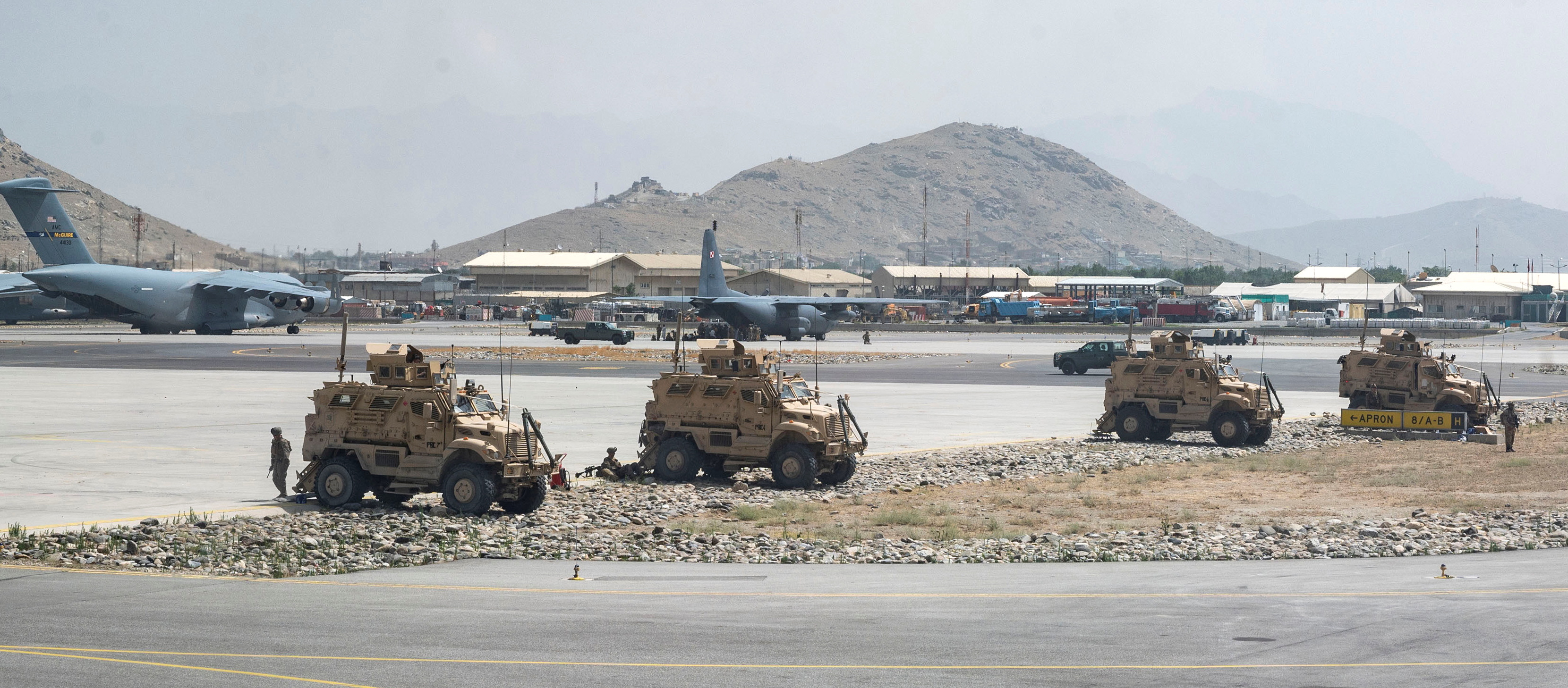 U.S. Army soldiers assigned to the 82nd Airborne Division patrol Hamid Karzai International Airport in Kabul