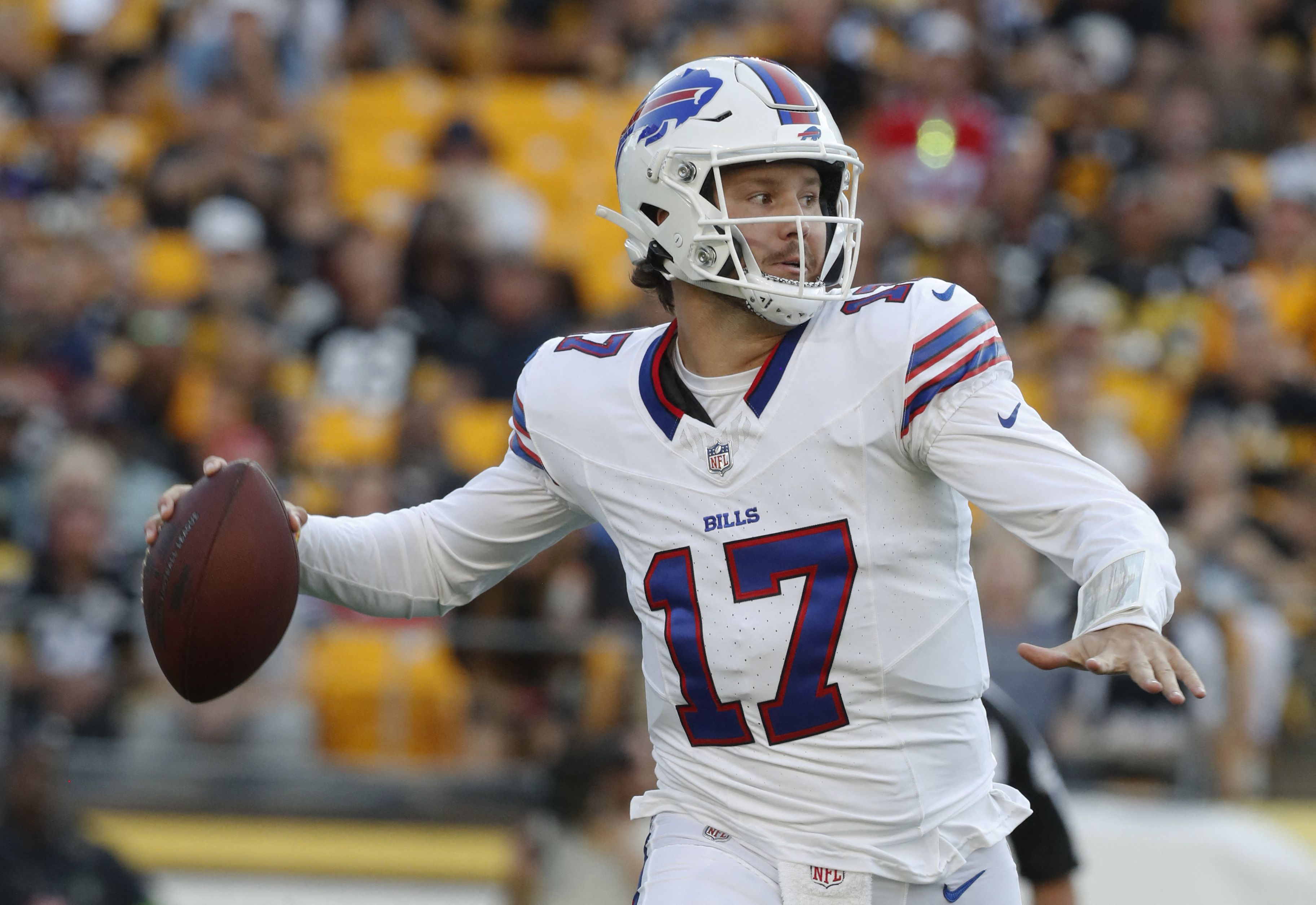 Pittsburgh Steelers quarterback Kenny Pickett, center, sits on the bench  during an NFL preseason football game against the Buffalo Bills in  Pittsburgh, Sunday, Aug. 20, 2023. (AP Photo/Gene J. Puskar Stock Photo 