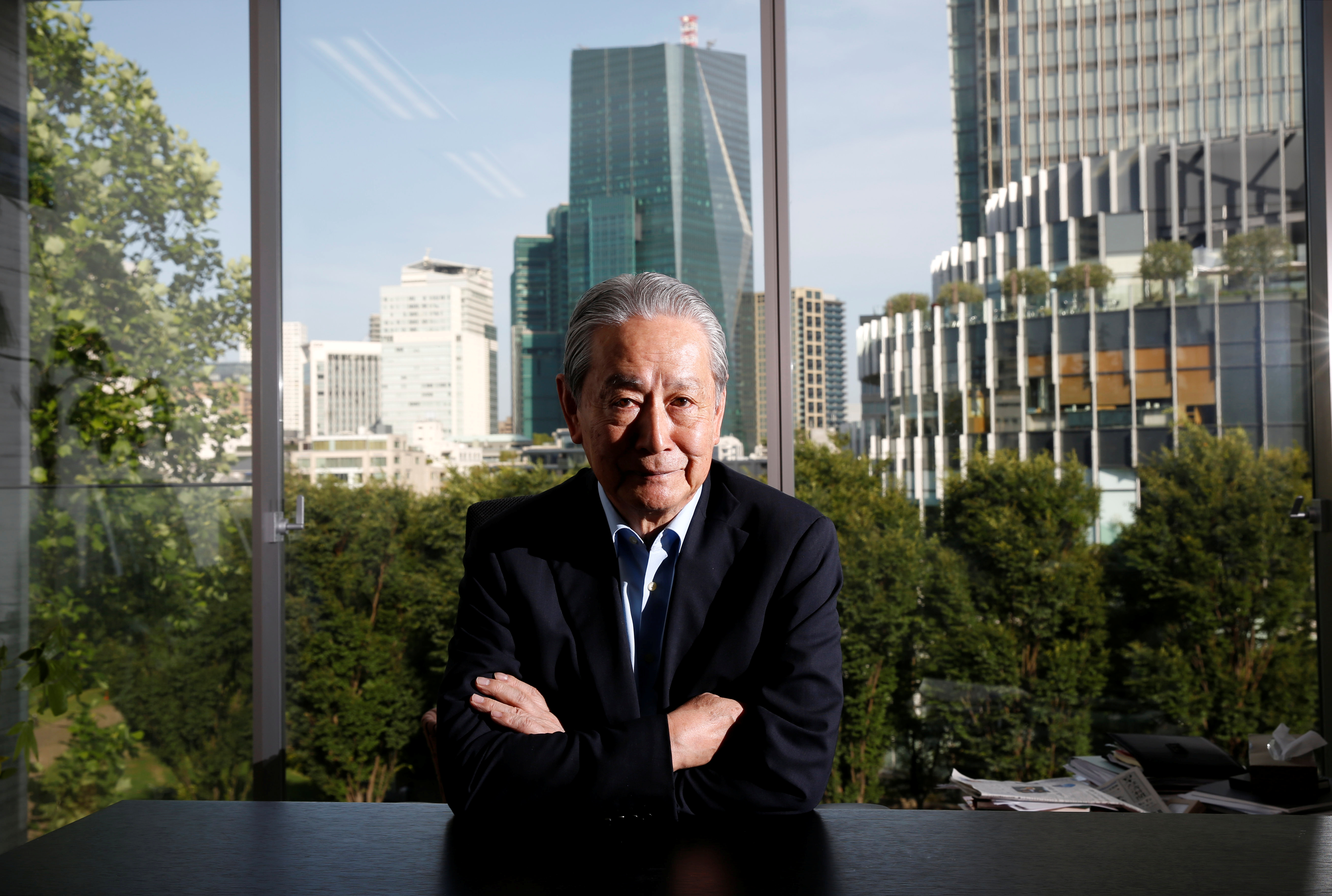Quantum Leaps Corp. Founder and CEO Nobuyuki Idei poses for a photograph during an interview with Reuters in Tokyo