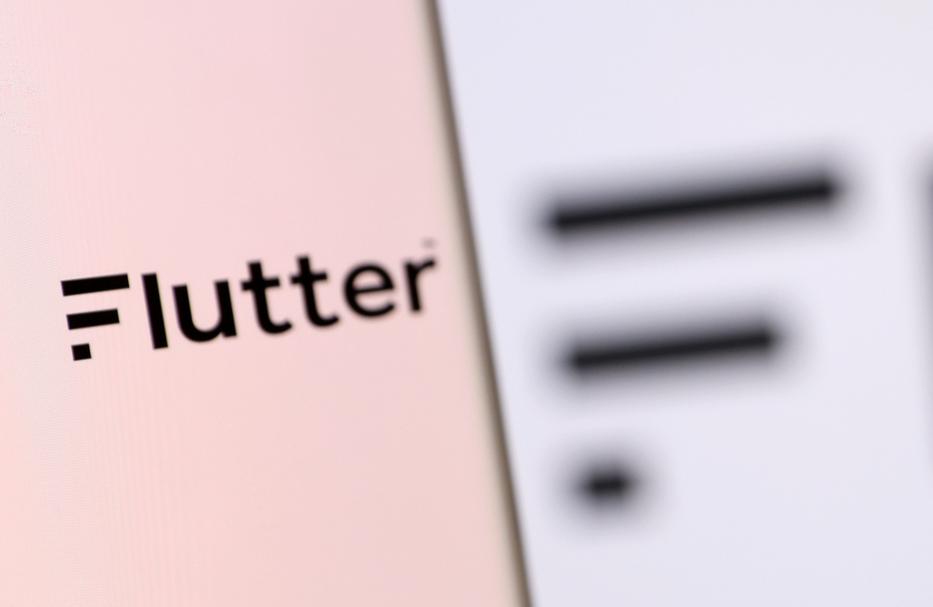 Illustration shows smartphone with Flutter's logo displayed