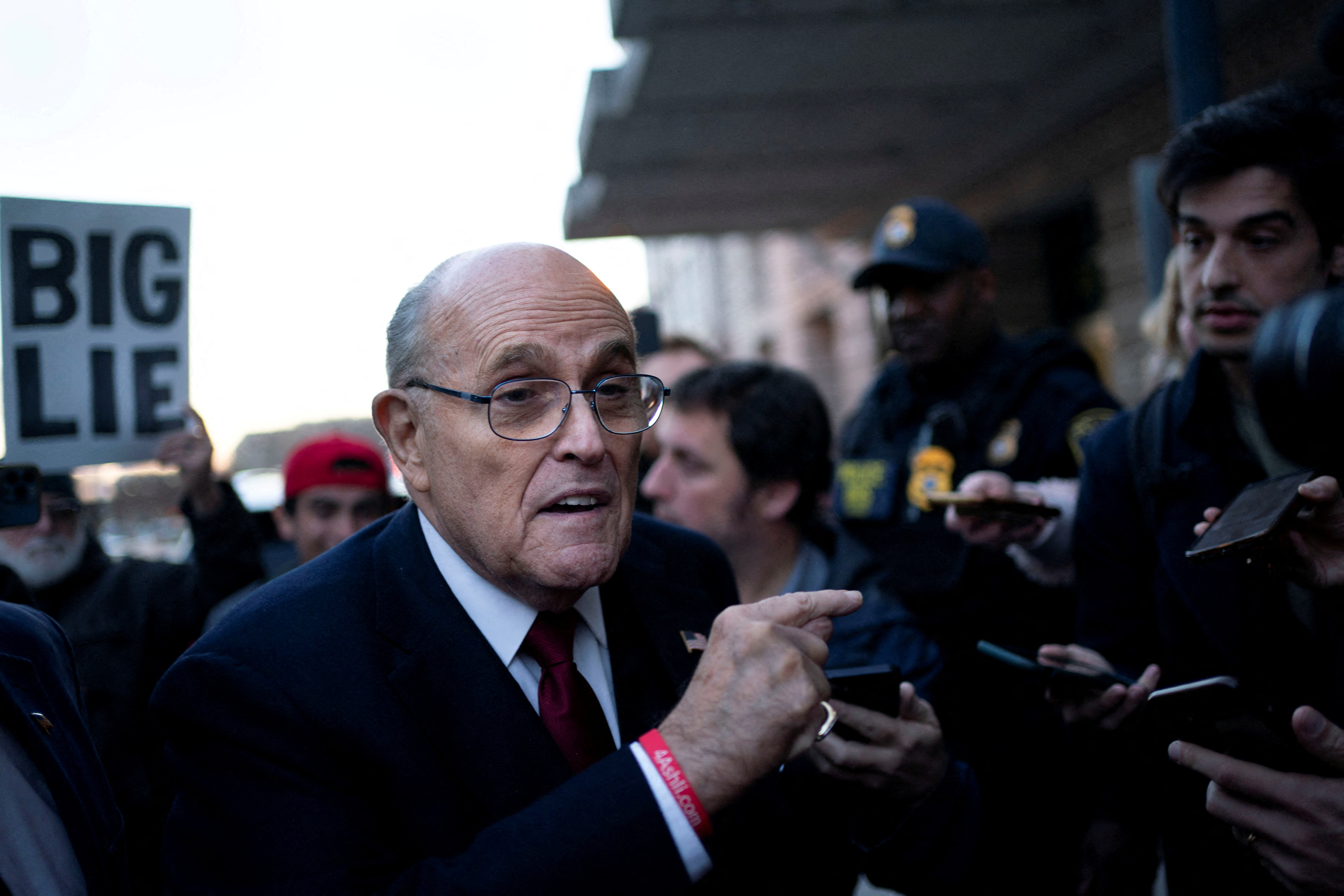 Former New York Mayor Rudy Giuliani departs defamation lawsuit at the District Courthouse in Washington