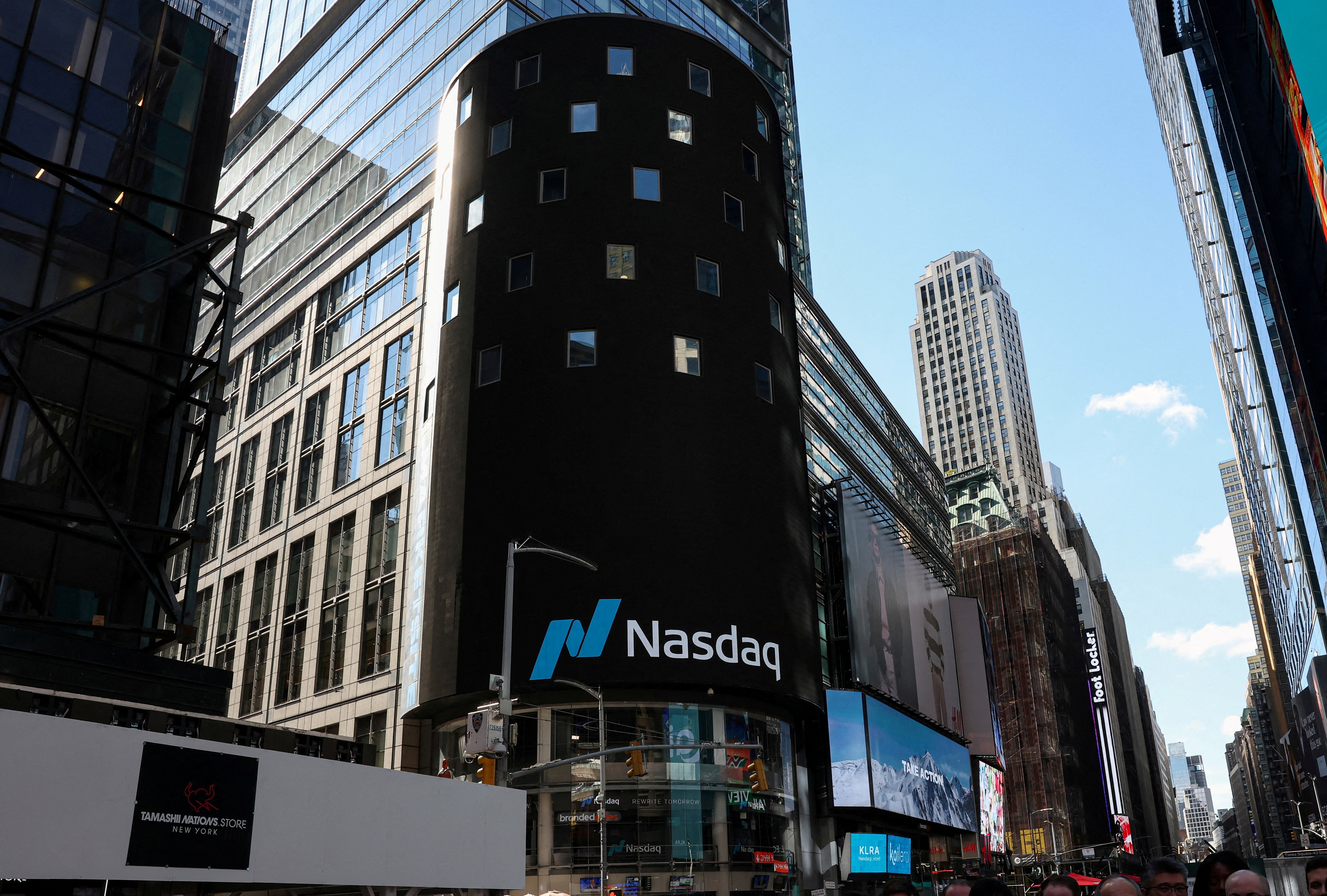 Nasdaq futures underpinned by strong AI forecasts; focus on earnings, data