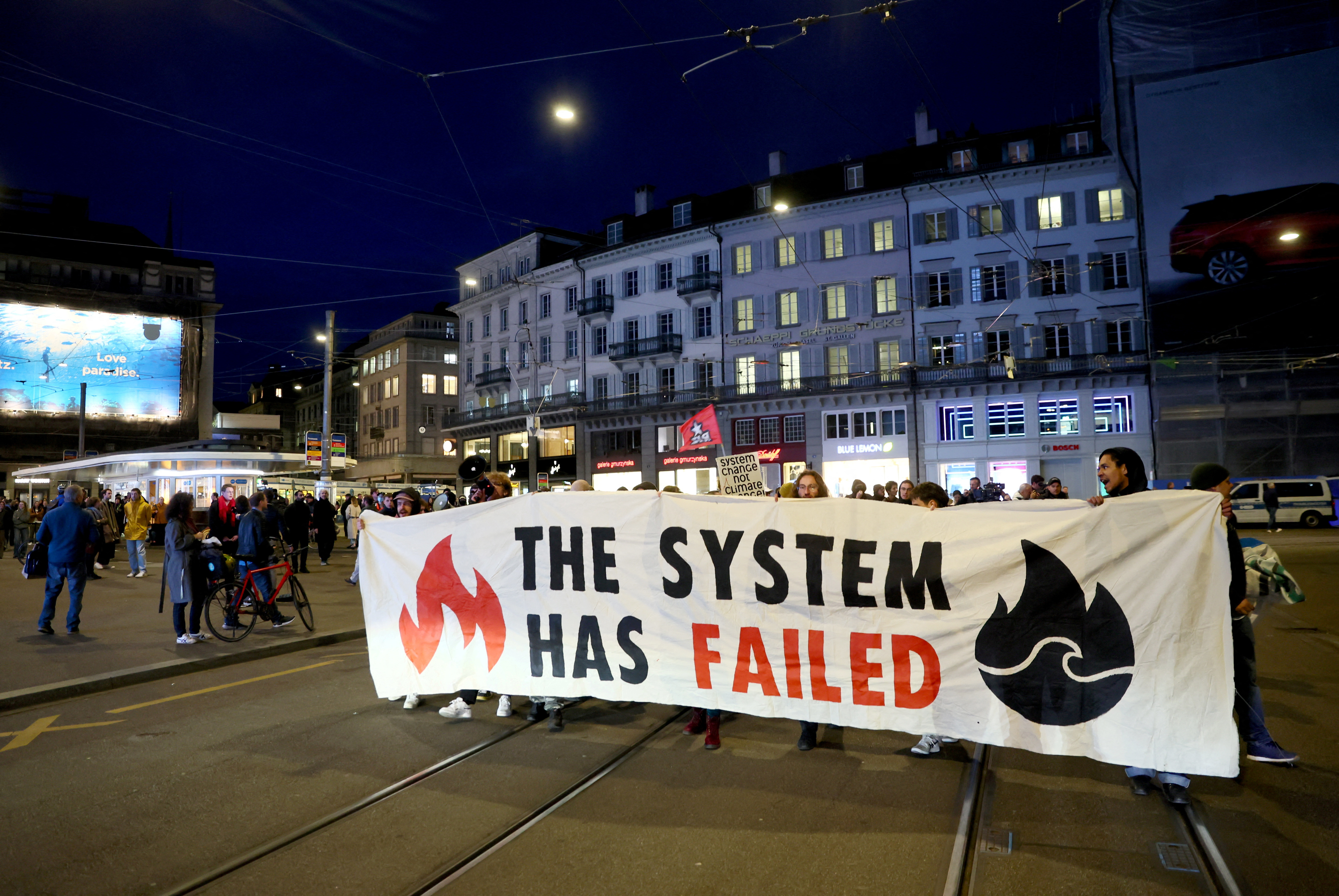 People demonstrate against the buying of Swiss bank Credit Suisse by UBS, in Zurich