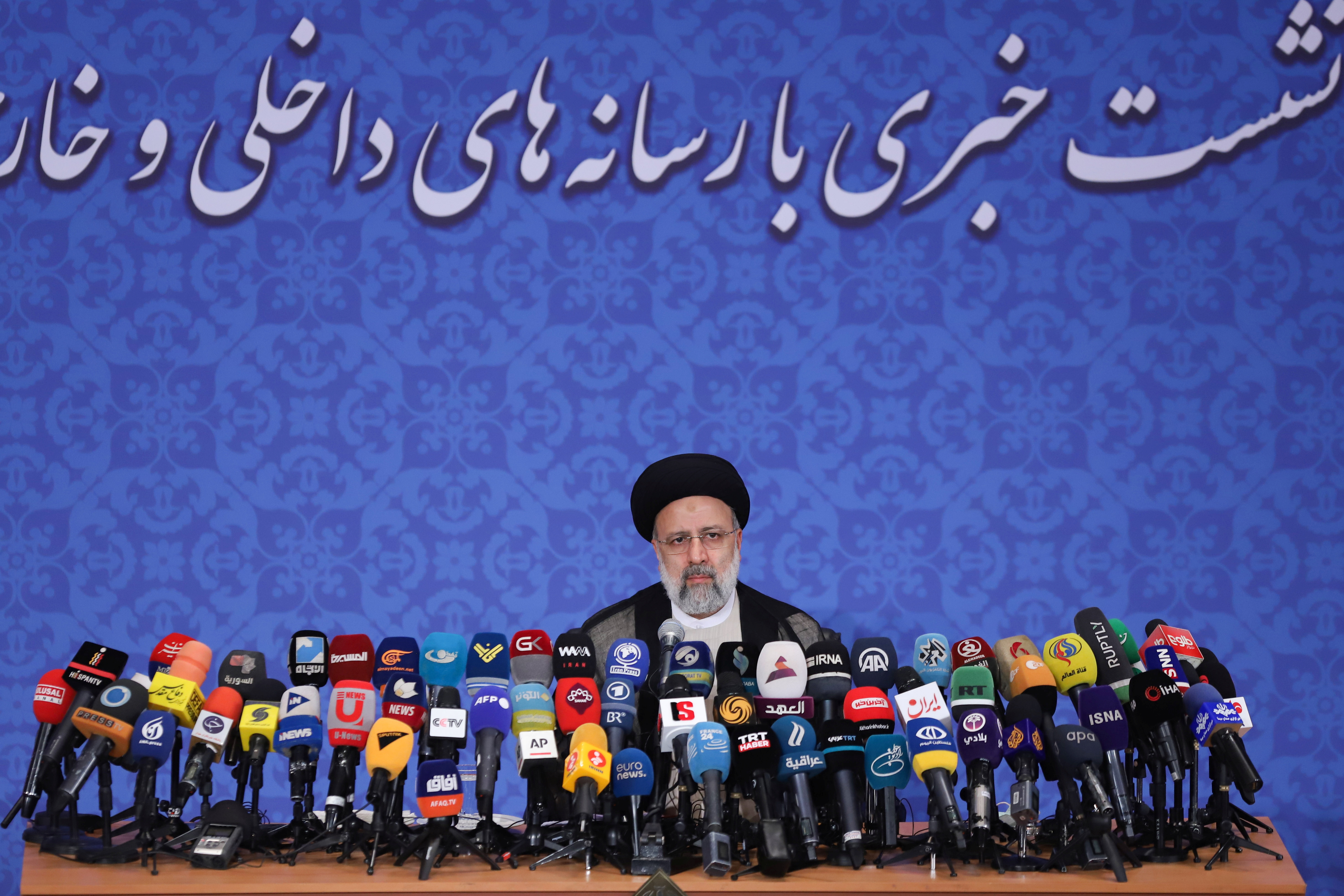 Iran's President-elect Ebrahim Raisi attends a news conference in Tehran