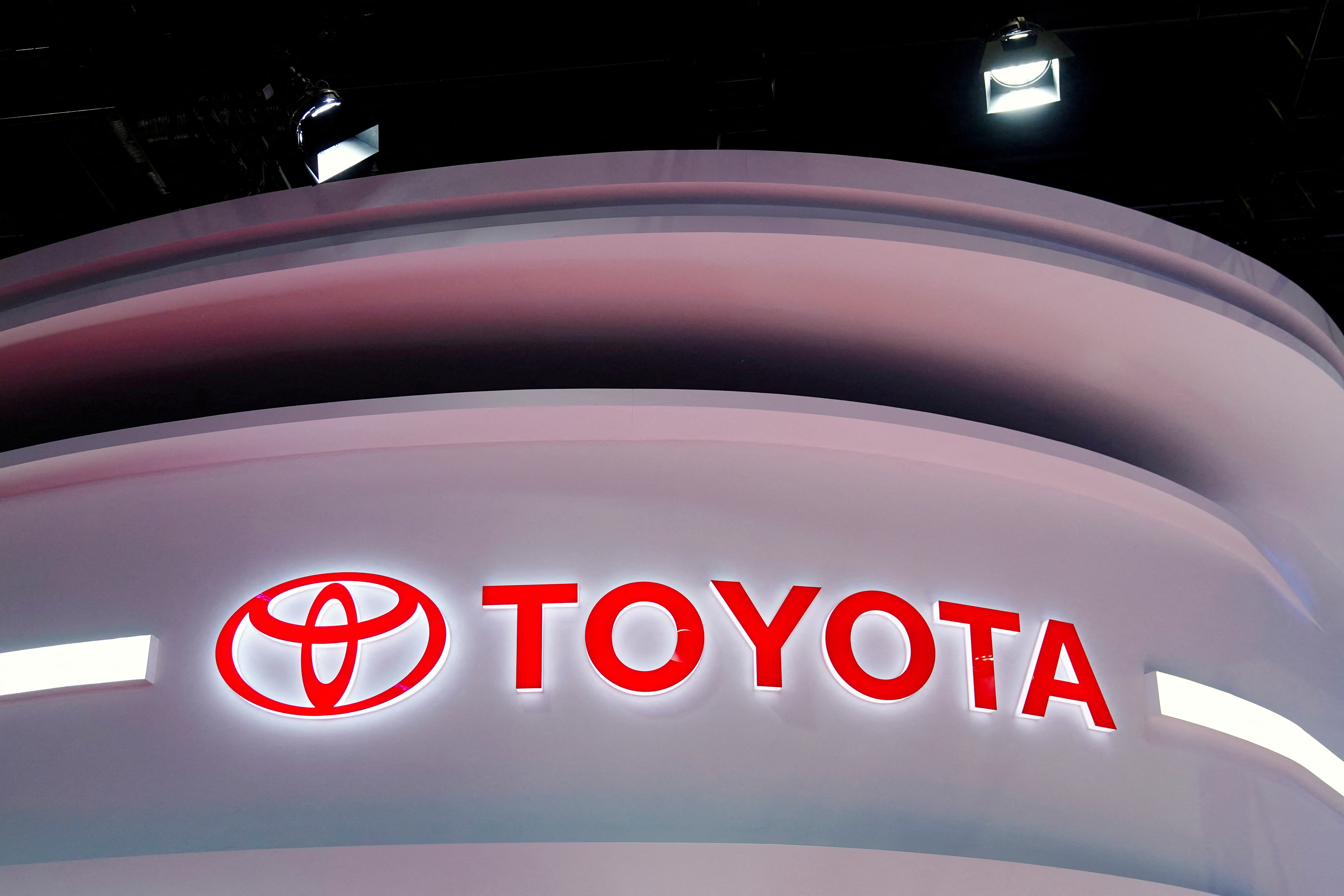 The Toyota logo is seen at its booth during a media day for the Auto Shanghai show