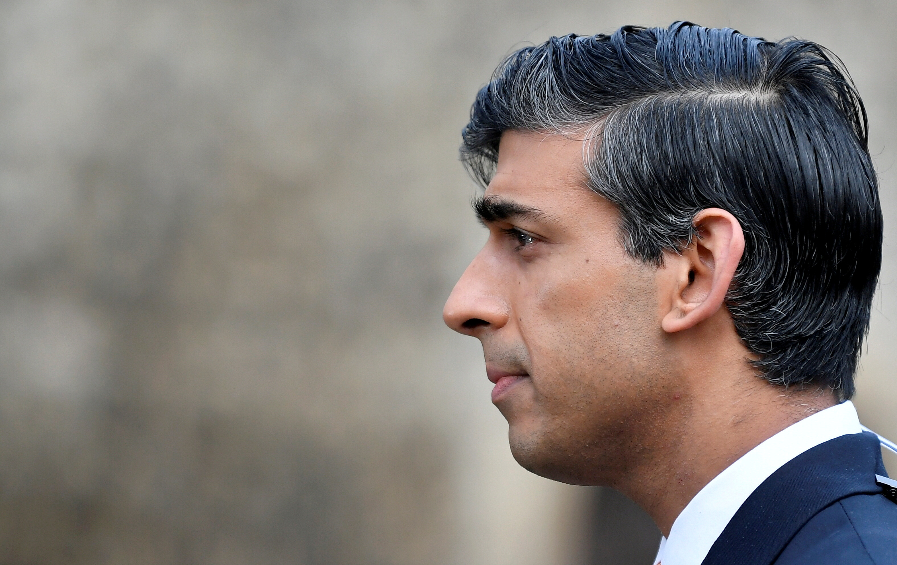 Britain's Chancellor of the Exchequer Rishi Sunak takes part in an outside broadcast interview, in London