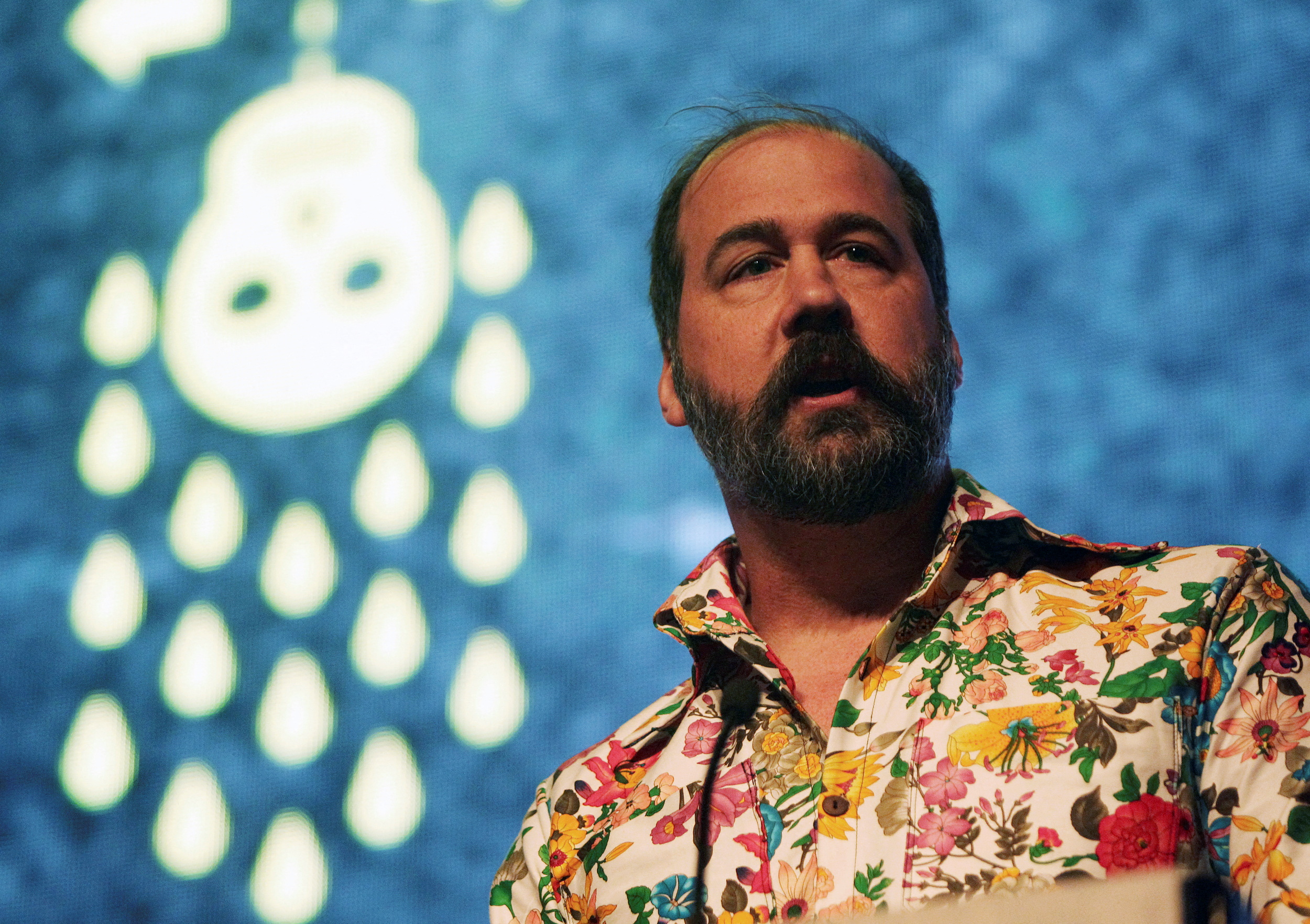 Former Nirvana bassist Krist Novoselic speaks to guests at the premiere of the 