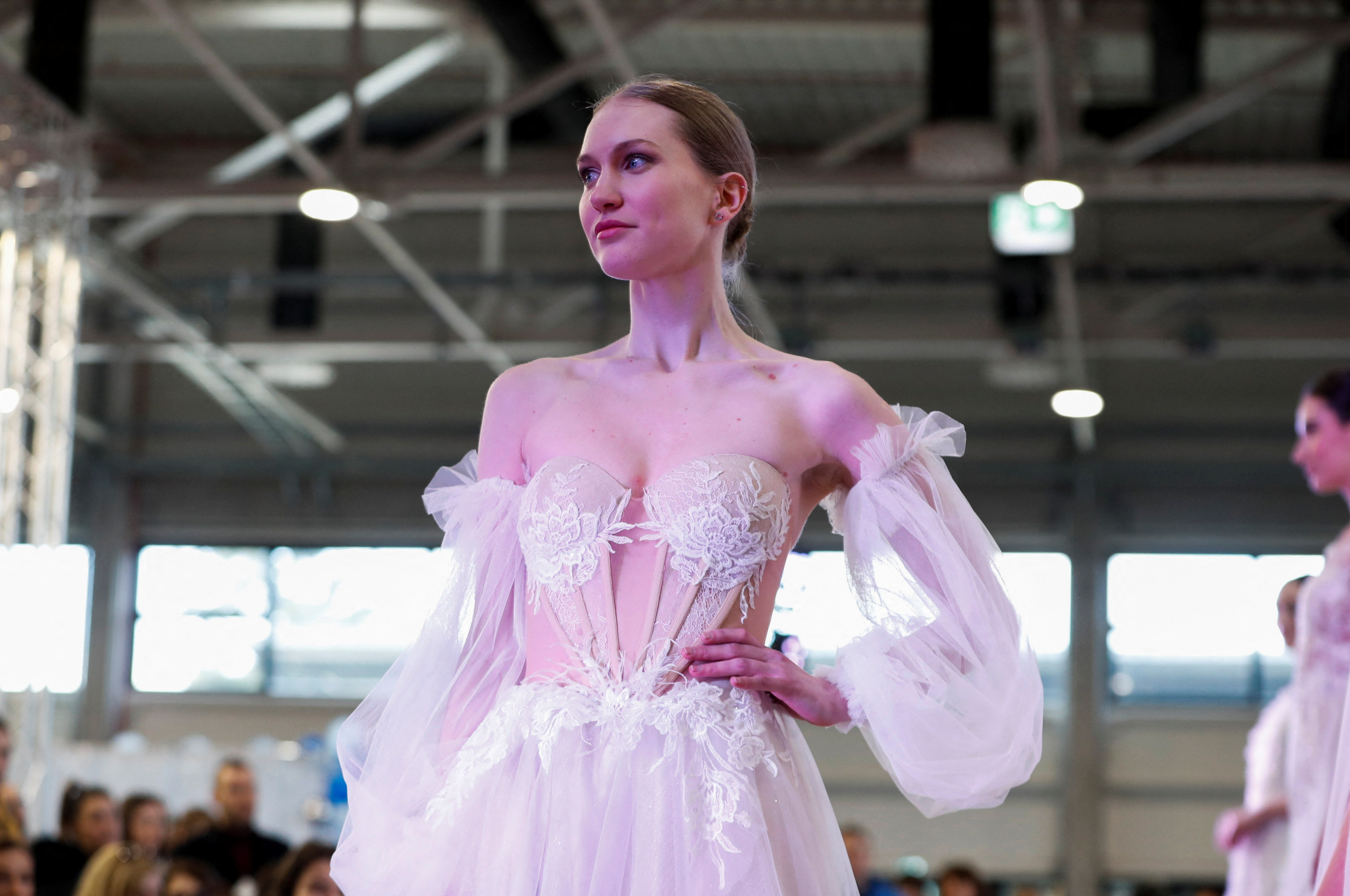 A model presents a wedding dress creation from Noriluca during the Central European Wedding Show in Budapest