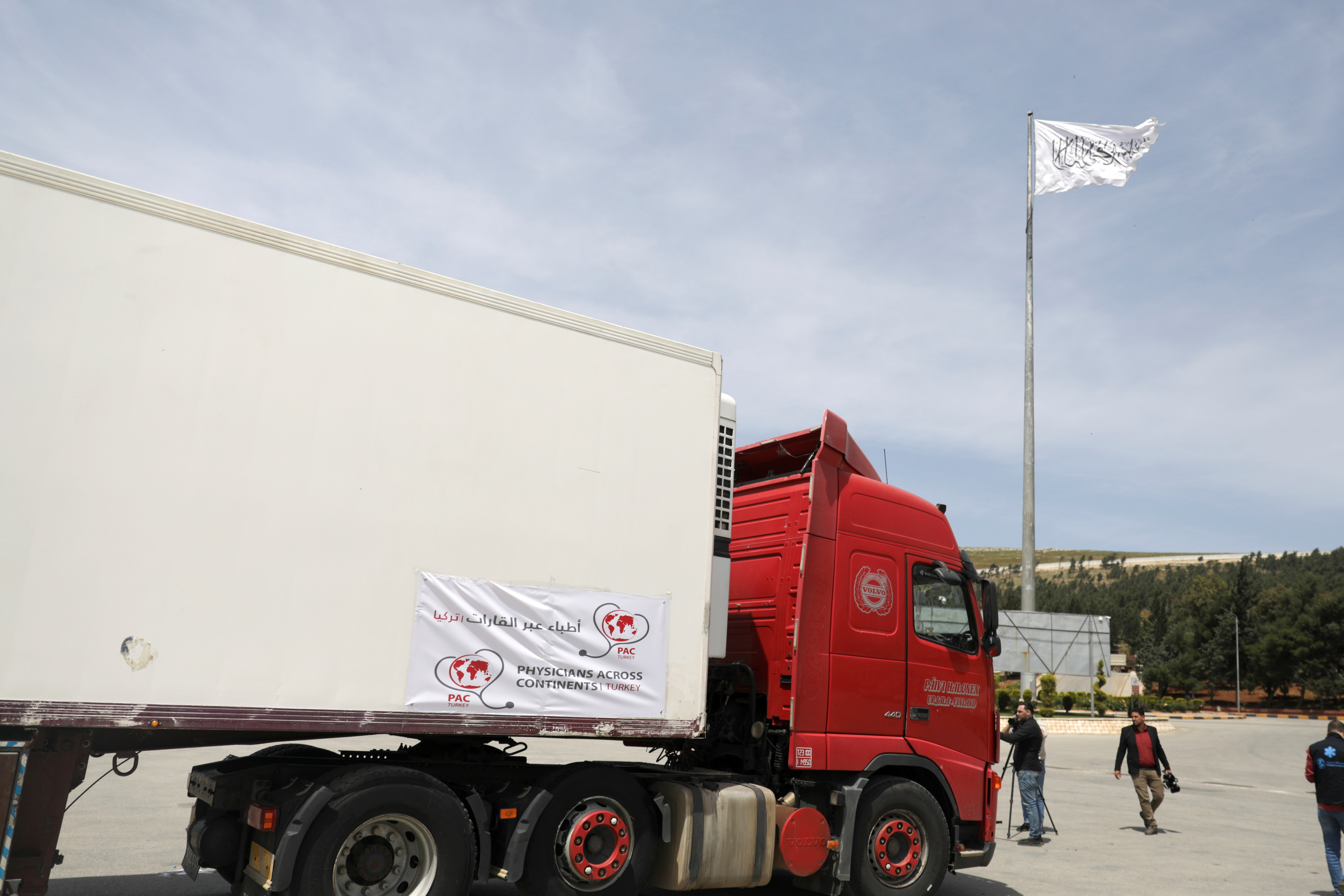 First shipment of COVID-19 vaccines arrives at Bab al-Hawa crossing at Syrian-Turkish border, in Idlib governorate