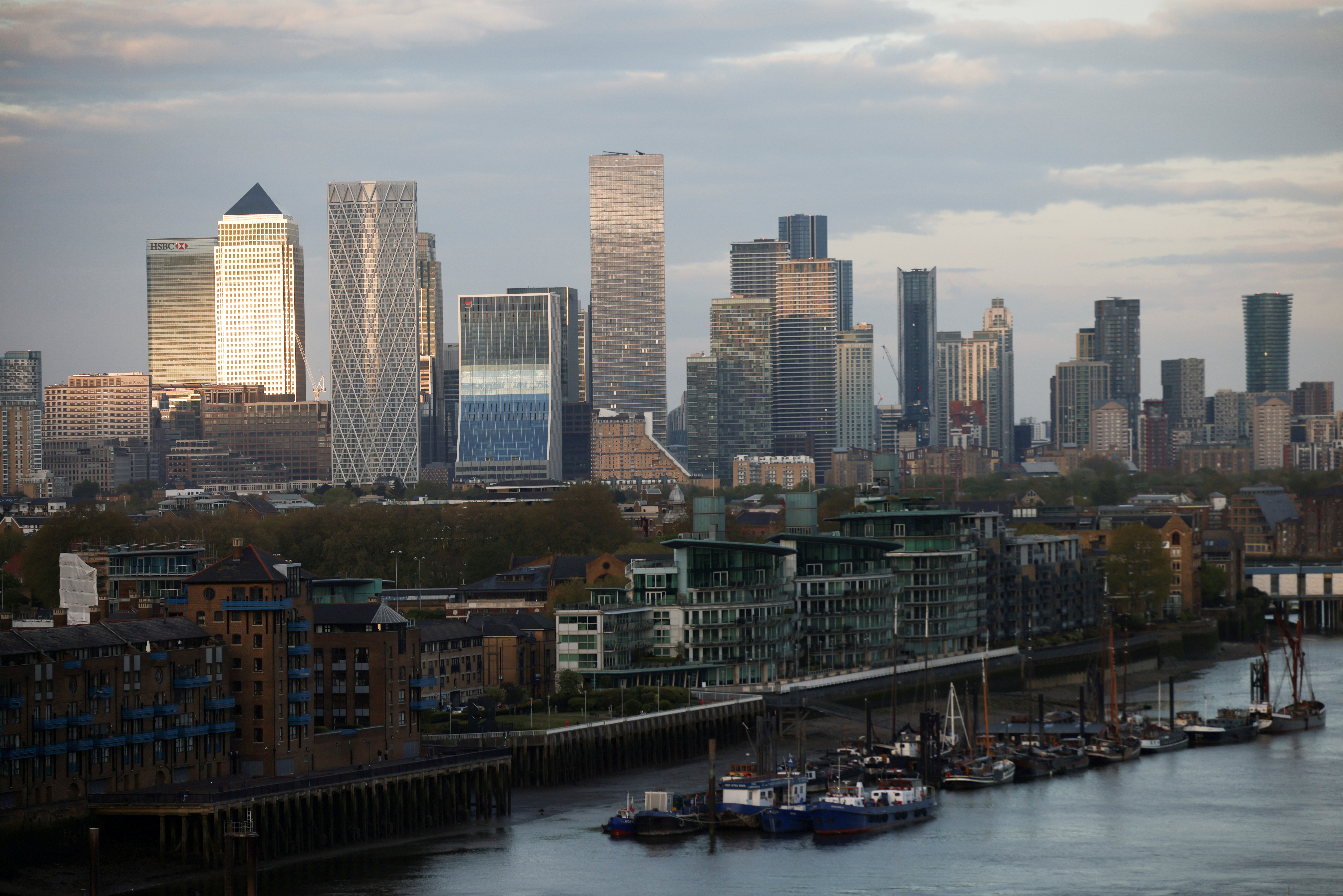 Skyscrapers in The City of London financial district are seen from City Hall in London
