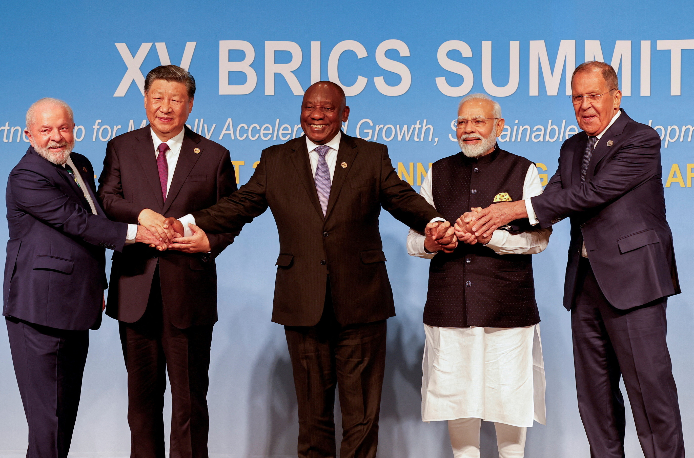 Investors see long wait for enlarged BRICS' economic boon | Reuters