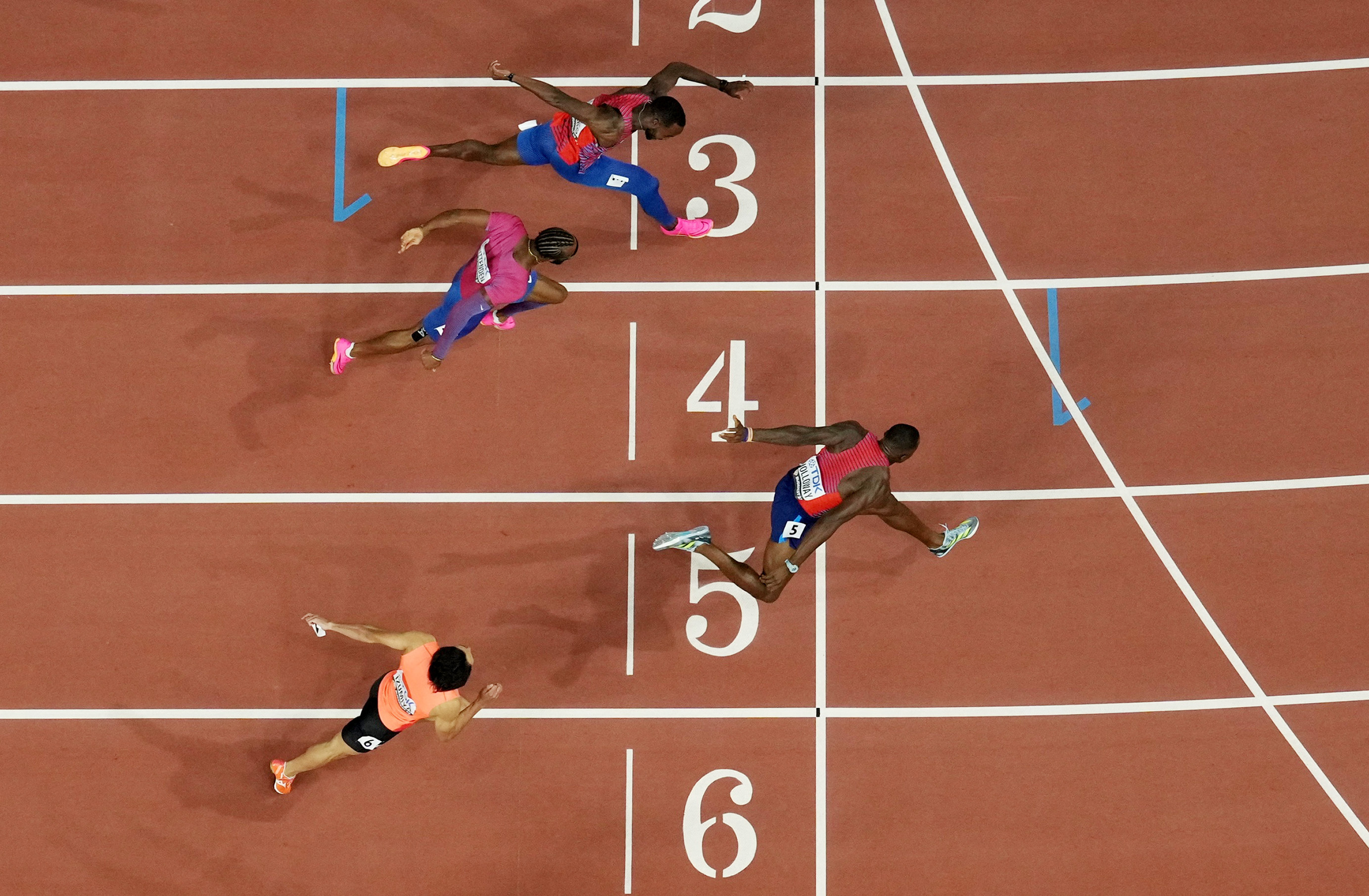 American Holloway wins third straight world 110m hurdles title Reuters