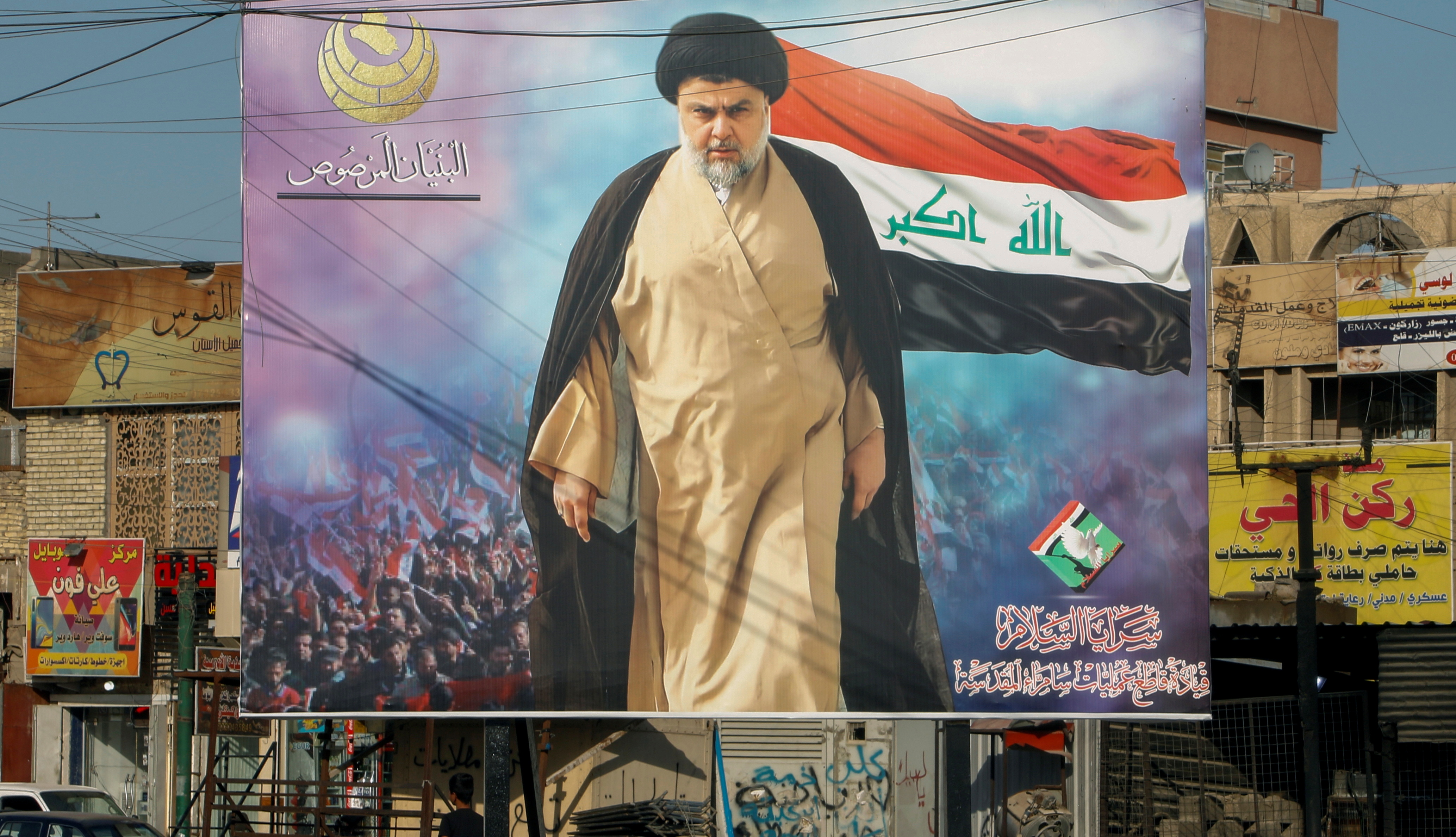 A poster of Iraqi Shi'ite cleric Moqtada al-Sadr in the Sadr City district of Baghdad, Iraq June 21, 2021. REUTERS/Ahmed Saad
