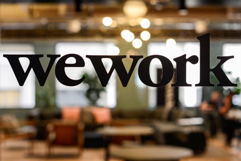 A WeWork logo is seen at a WeWork office in San Francisco, California, September 30, 2019. REUTERS/Kate Munsch/File Photo