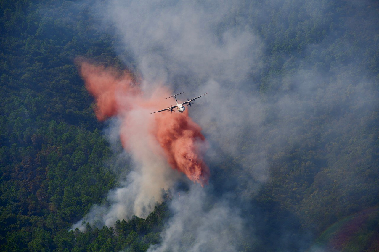 An aircraft drops fire retardant on a wildfire that broken out in the Var region, southern France, August 18, 2021. Ministere de l'Interieur/J. Groisard/Handout via REUTERS 