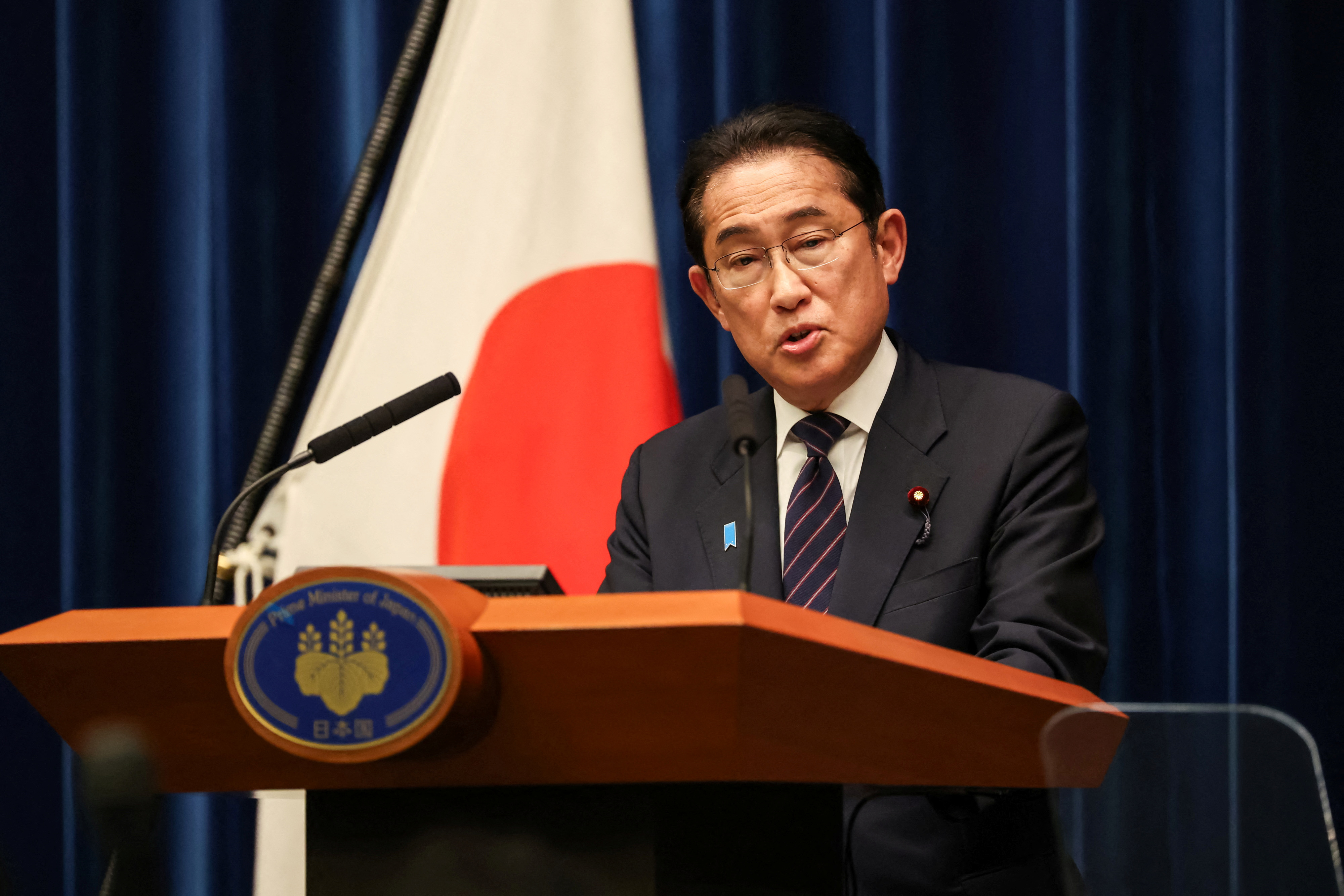 Japan's new cabinet reflects PM's focus on gender and defence