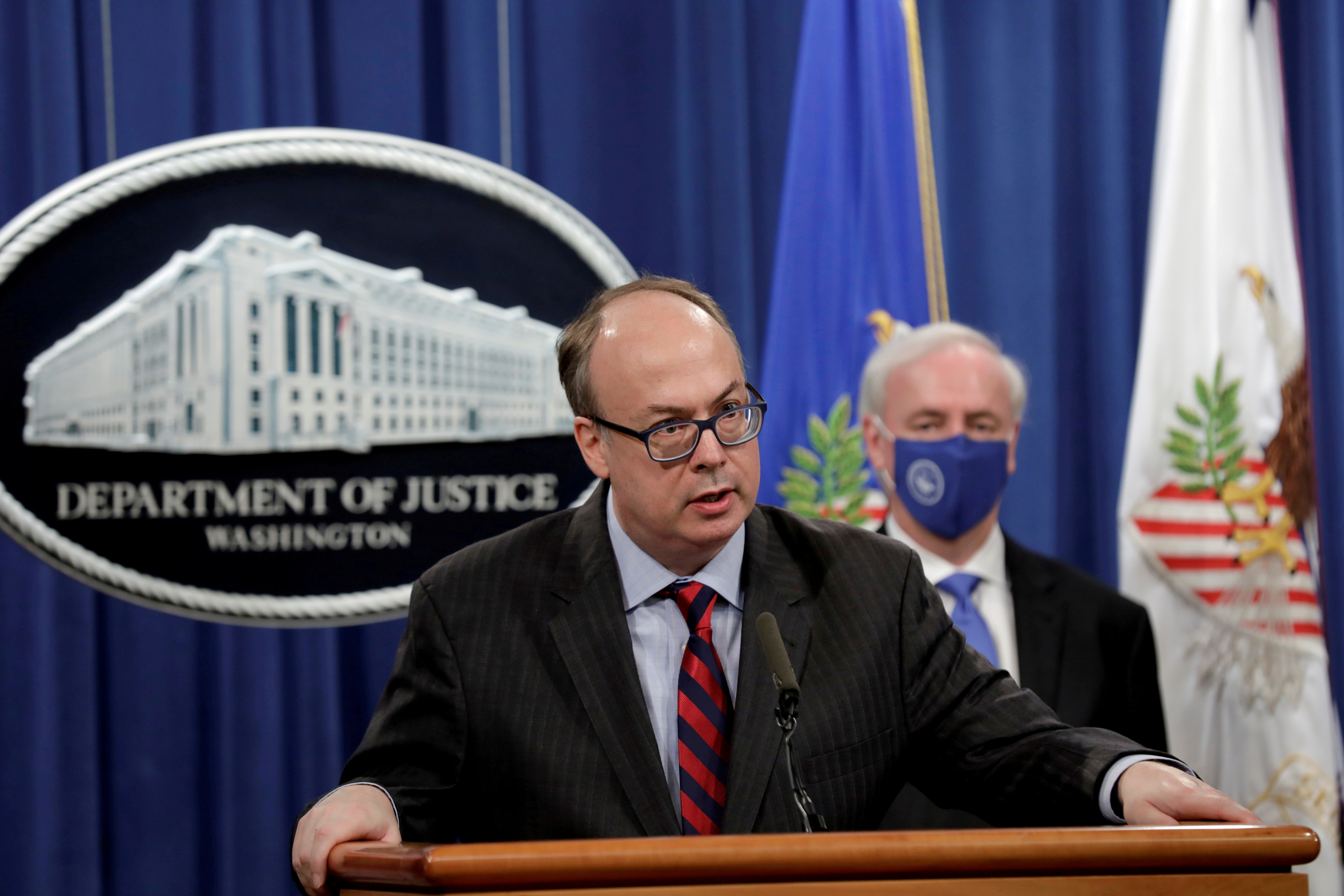 Then-Acting Assistant U.S. Attorney General Jeffrey Clark speaks next to Deputy U.S. Attorney General Jeffrey Rosen at a news conference at the Justice Department in Washington, U.S., October 21, 2020. REUTERS/Yuri Gripas/Pool/File Photo