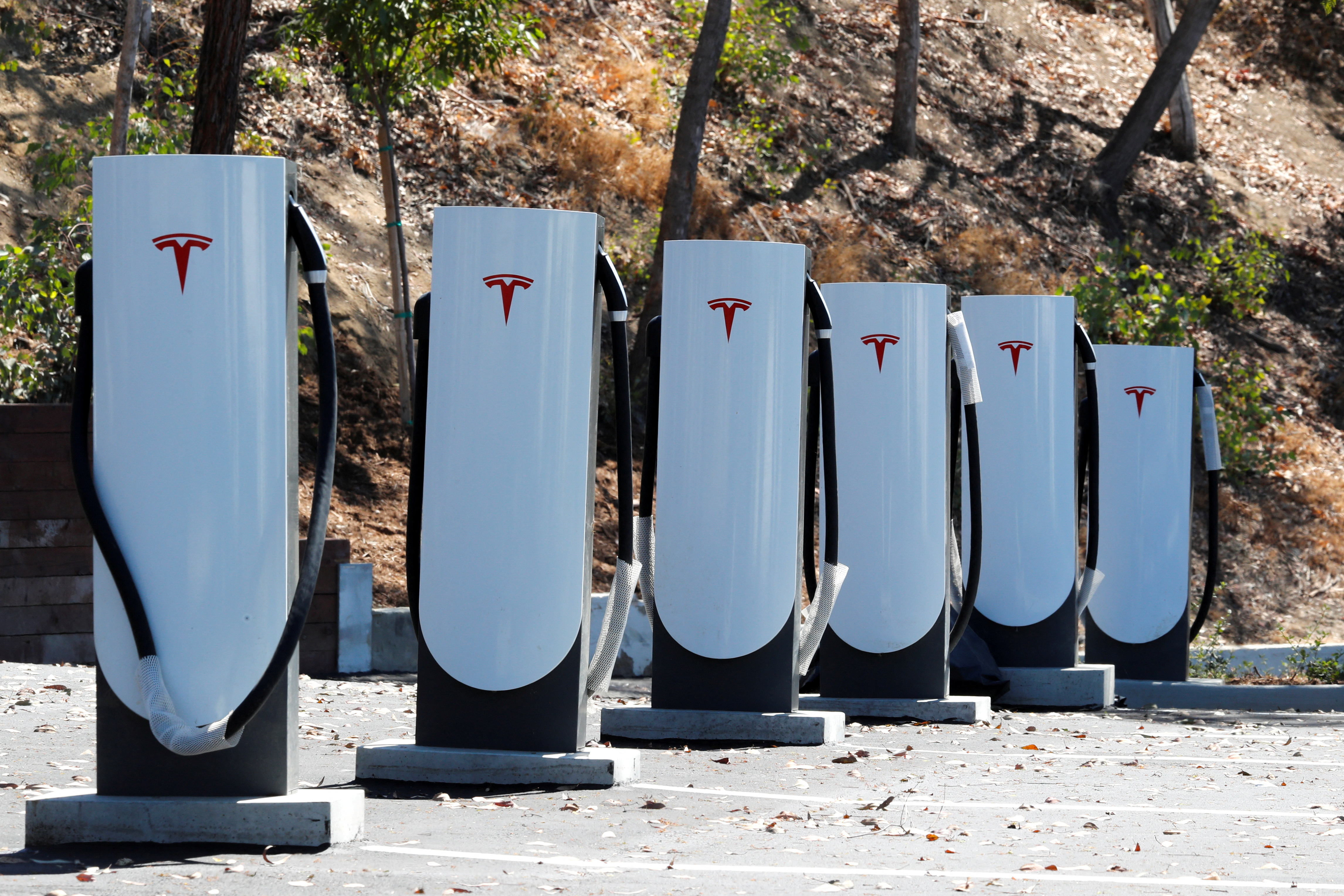 EV charger makers guardedly look to adopt Tesla standard