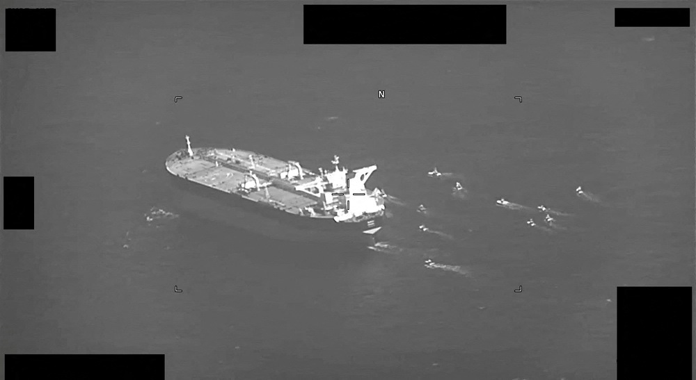 Fast-attack crafts from Iran’s Islamic Revolutionary Guard Corps Navy swarming Panama-flagged oil tanker Niovi as it transits the Strait of Hormuz from Dubai to port of Fujairah in the United Arab Emirates, Arabian Gulf early hours of May 3, 2023, are se