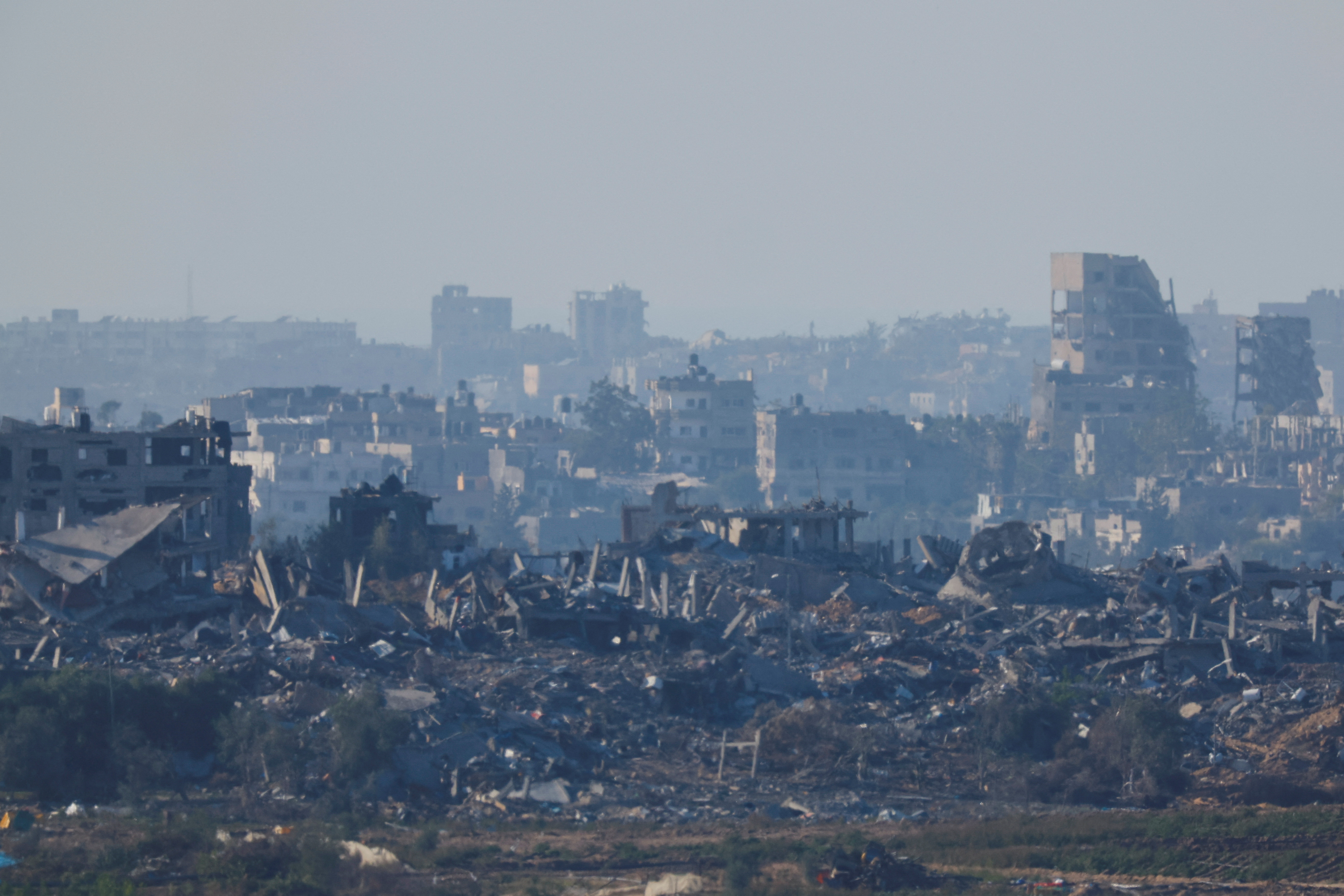 A view shows the damaged buildings of Northern Gaza strip, as seen from the viewpoint in Sderot