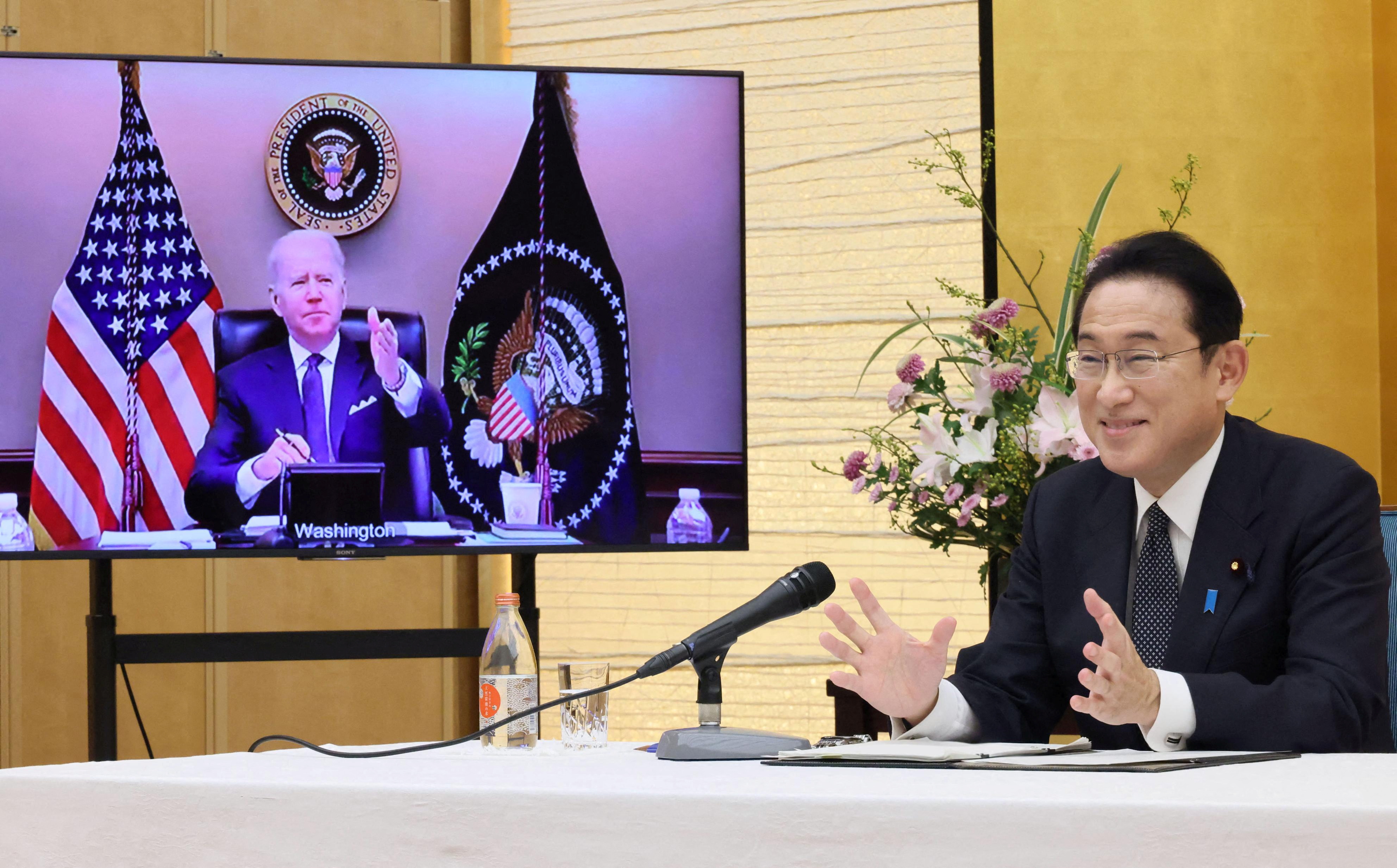 Japan's Prime Minister Fumio Kishida attends a virtual meeting with the U.S. President Joe Biden in Tokyo