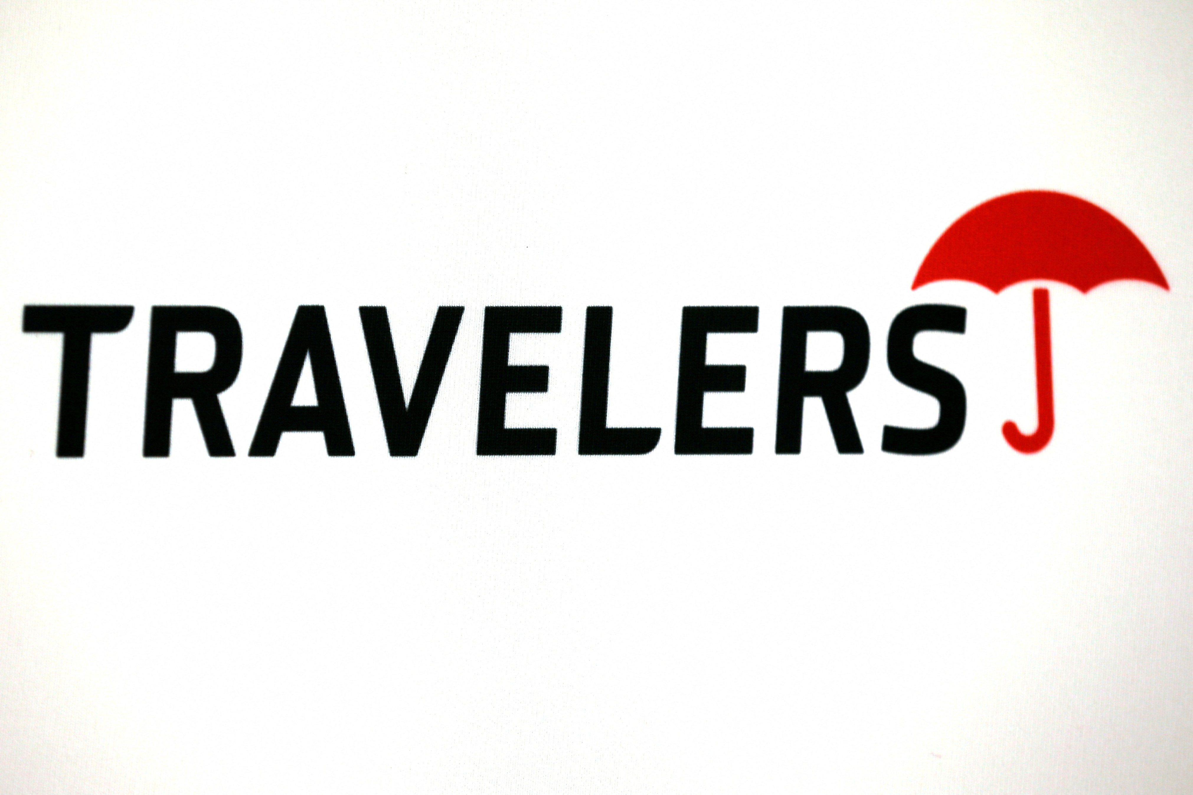 The logo of Dow Jones Industrial Average stock market index listed company Travelers Companies Inc (TRV) is seen in Los Angeles