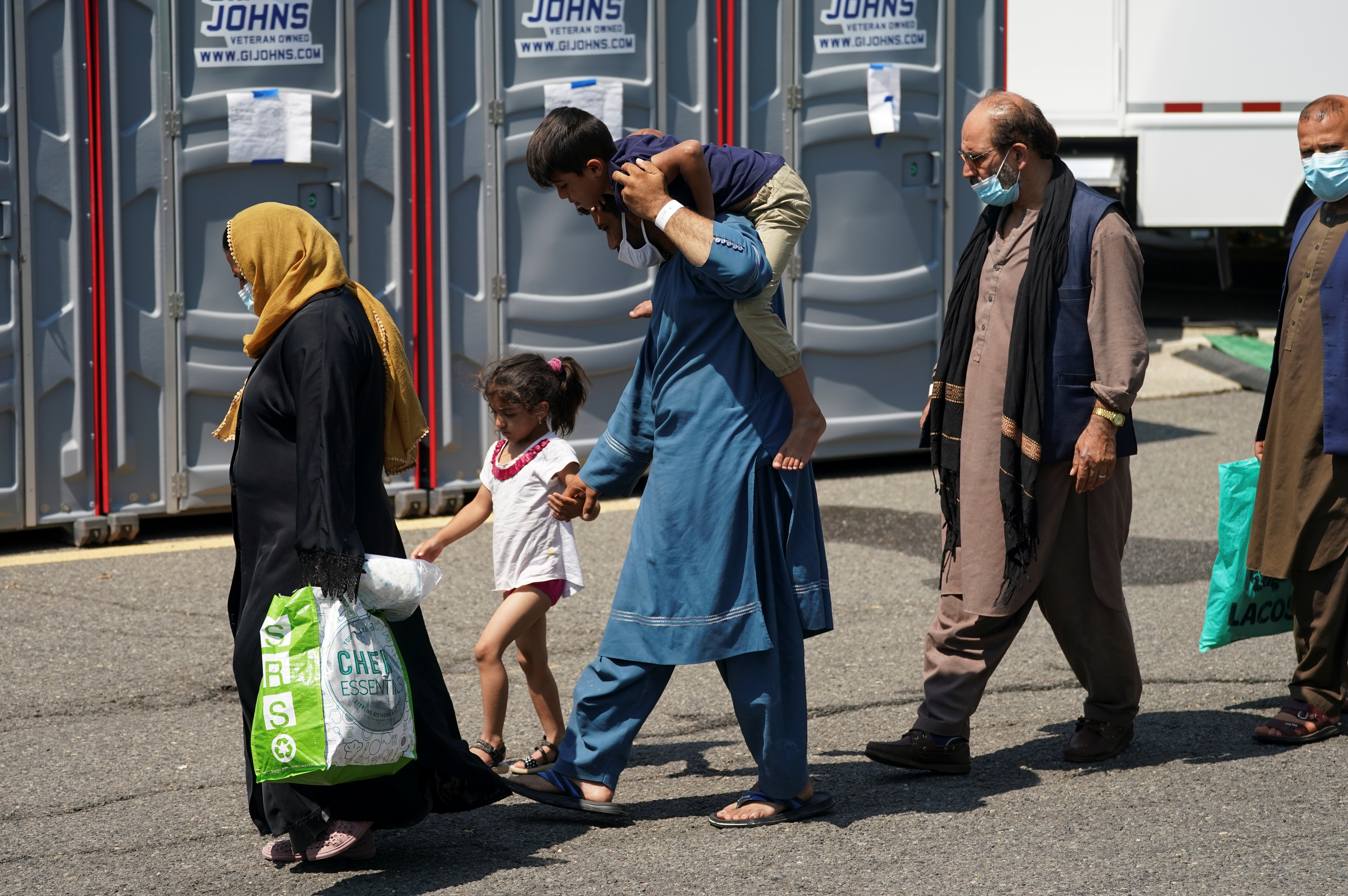 Afghan refugees at a processing center in Chantilly, Virginia