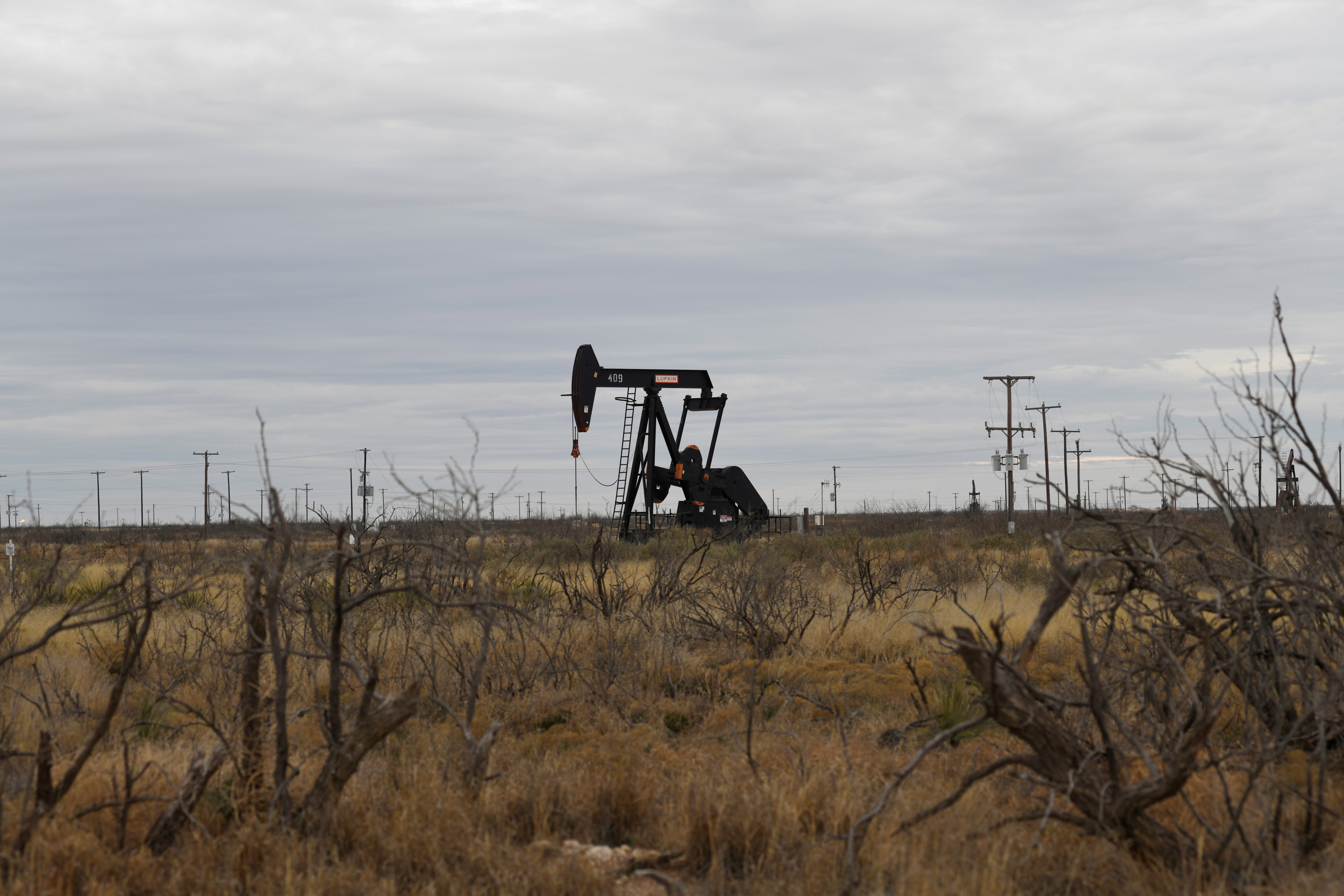 A pump jack operates in the Permian Basin oil and natural gas production area near Odessa