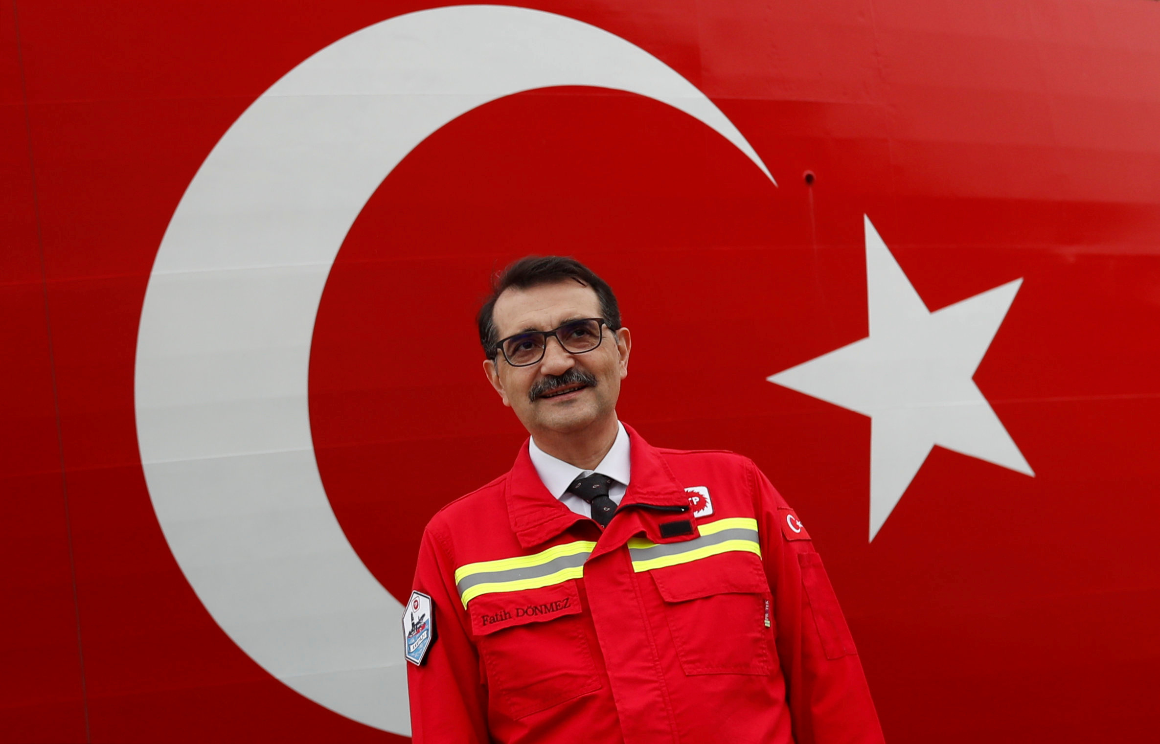 Turkey's Energy Minister Fatih Donmez poses in front of the Turkish drilling vessel Yavuz at Dilovasi port in the western city of Kocaeli, Turkey, June 20, 2019. REUTERS/Murad Sezer