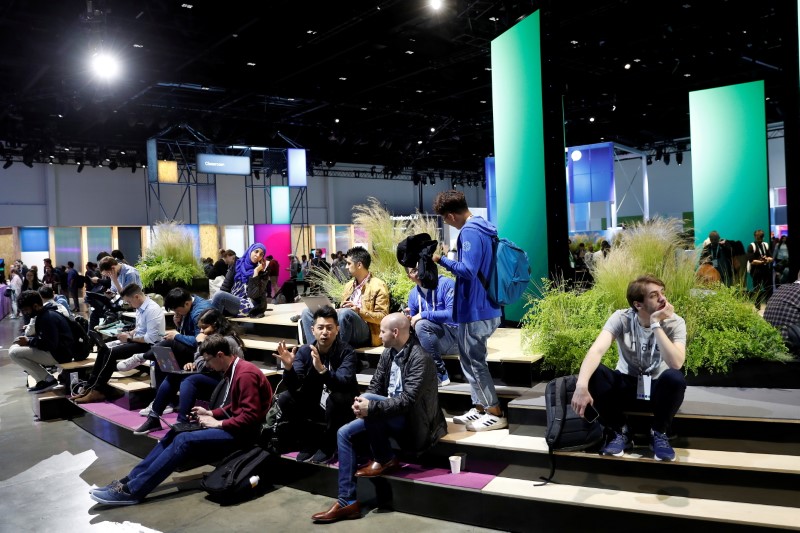 Attendees are seen inside the Festival Hall during Facebook Inc's F8 developers conference in San Jose, California