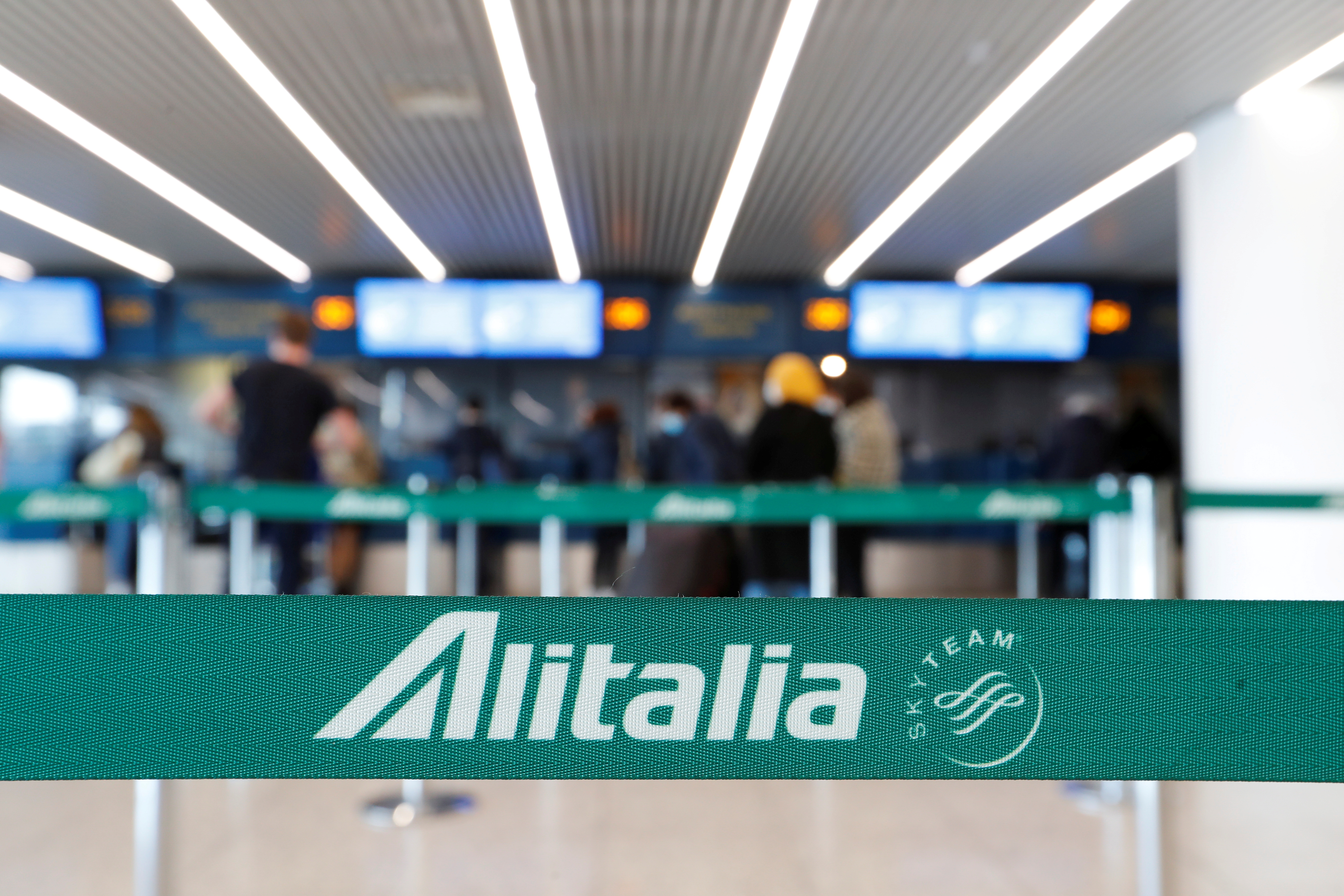 View of the Alitalia check-in counter at Fiumicino International Airport in Rome
