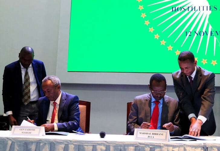 Field Marshal of the Ethiopian National Defence Force Birhanu Jula and Tadesse Werede Tesfay of the Tigray forces sign the implementation of the cessation of hostilities in Nairobi