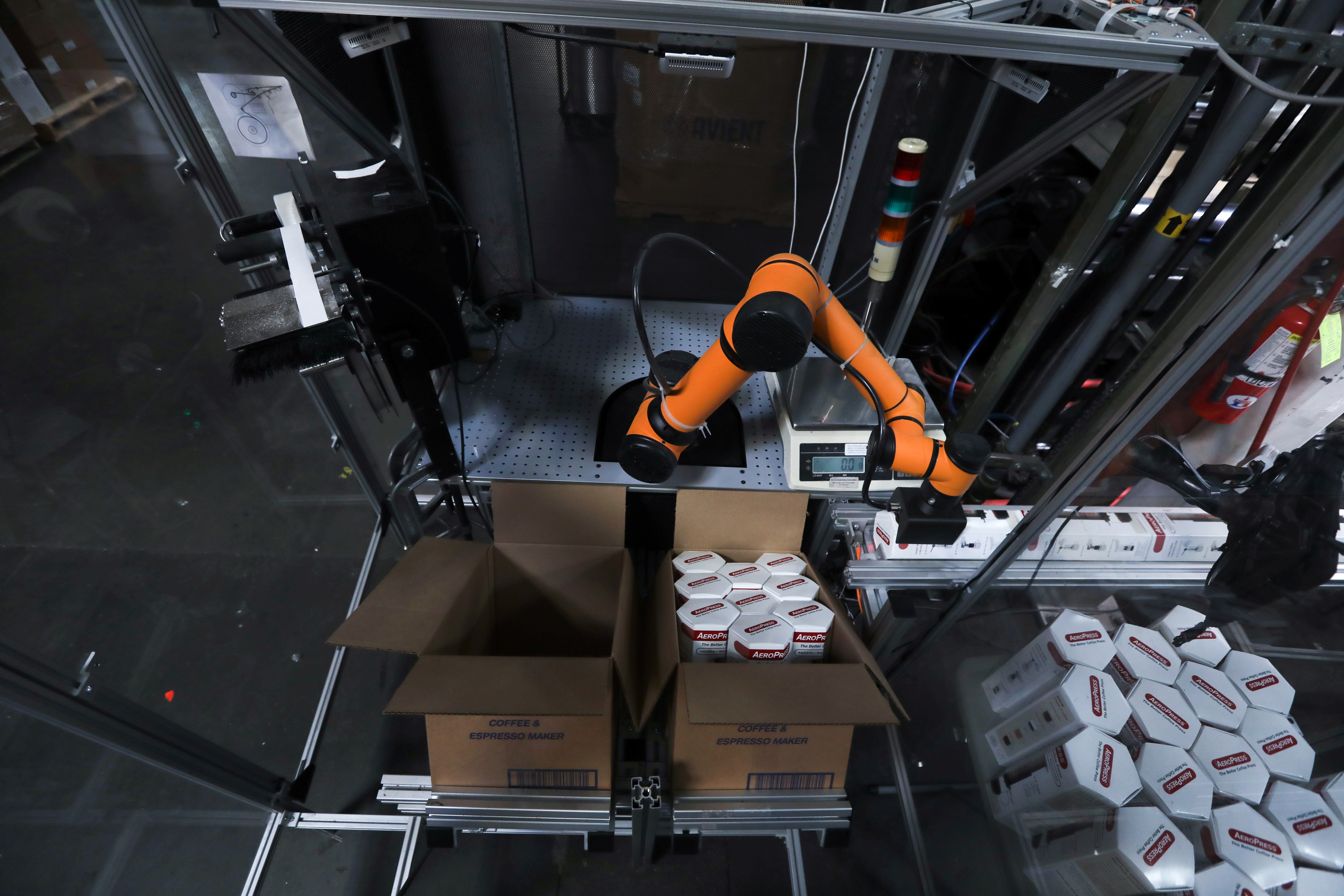A Rapid Robotics robot is seen from above as it moves a product in a Westec Plastics Corp warehouse in Livermore, California