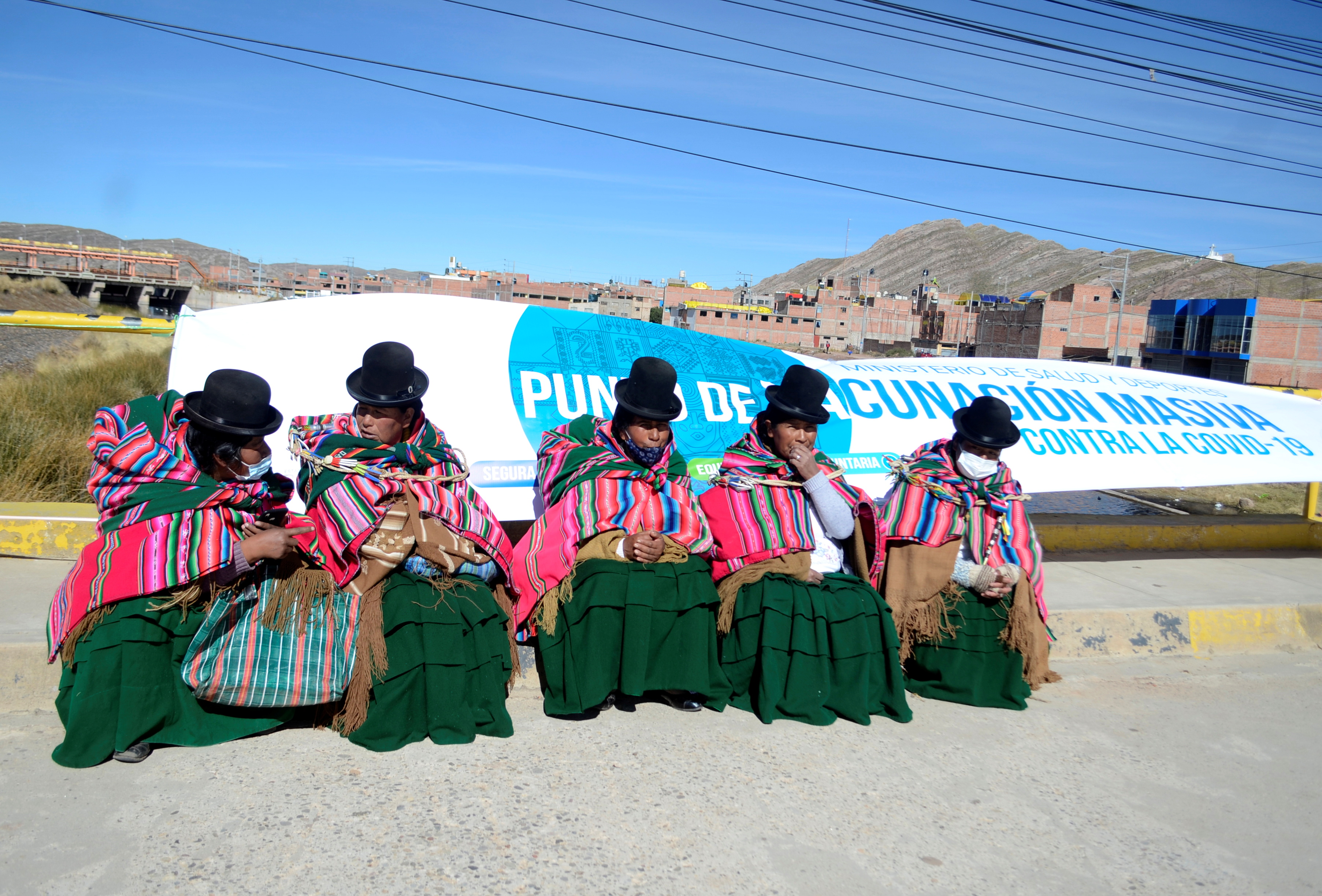 Vaccination against the coronavirus disease (COVID-19) at the border between Bolivia and Peru