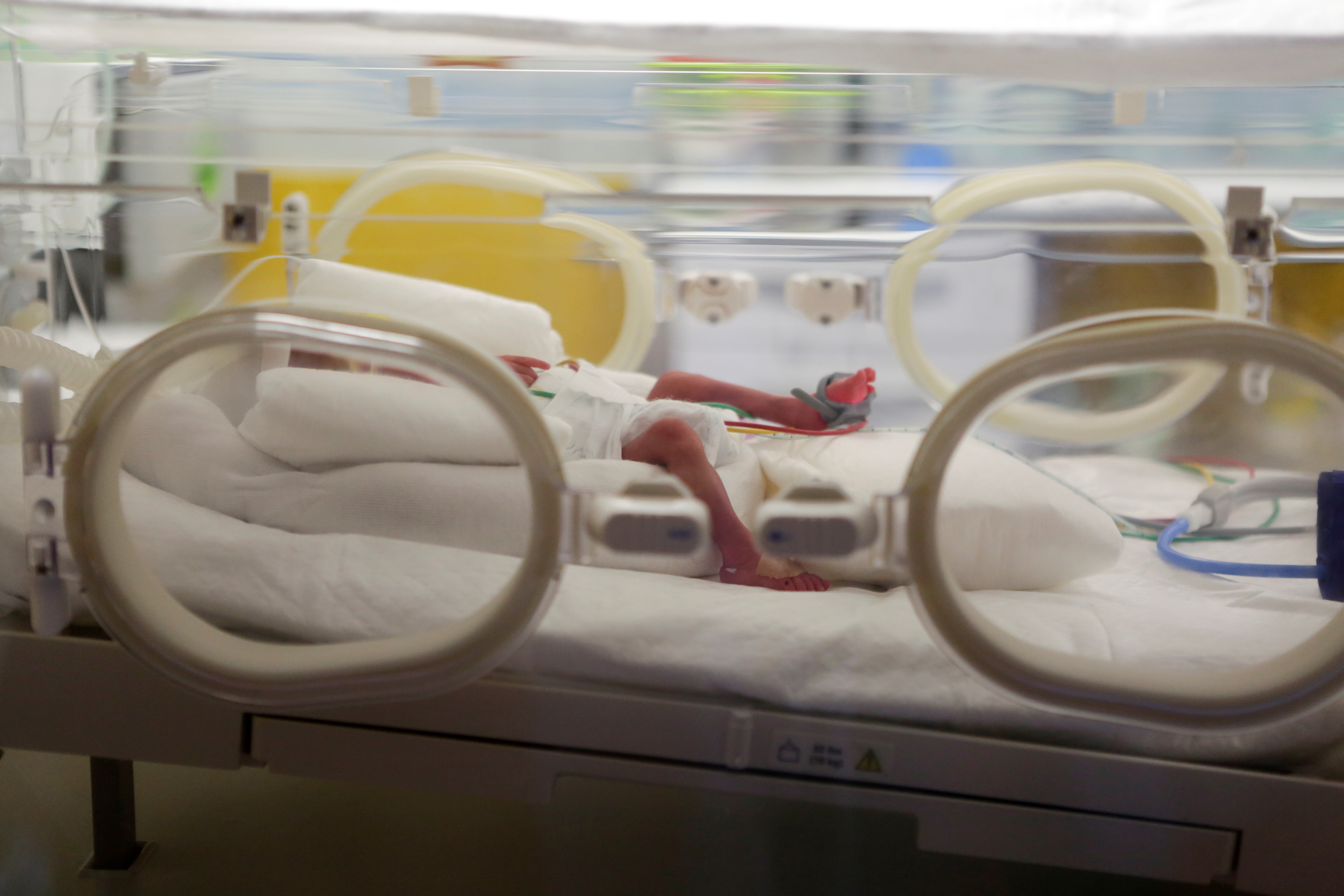 One of the newborn nonuplets is seen in an incubator at the private clinic of Ain Borja, in Casablanca