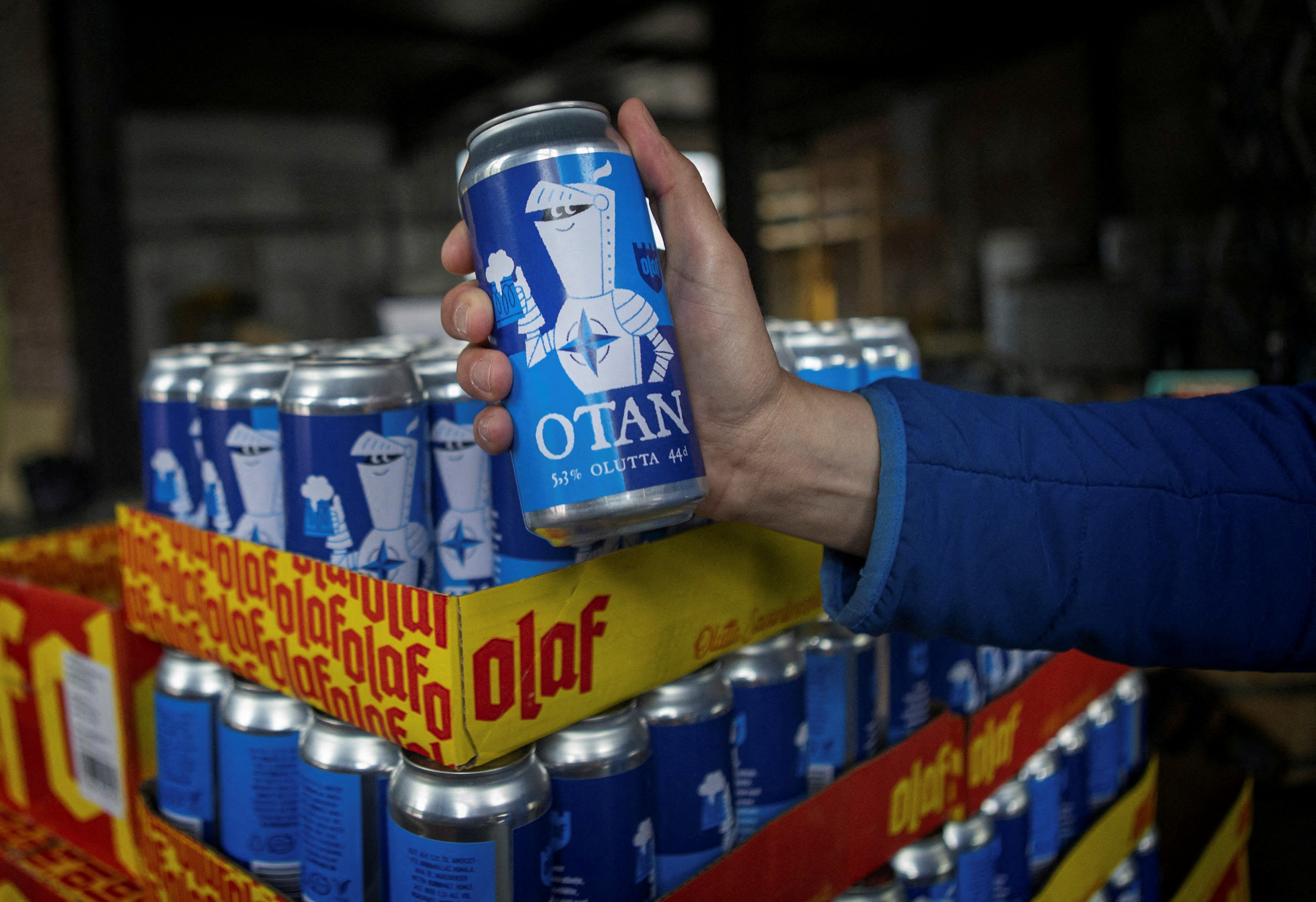 Nato-branded OTAN beer cans by Olaf Brewing Company are pictured in Savonlinna