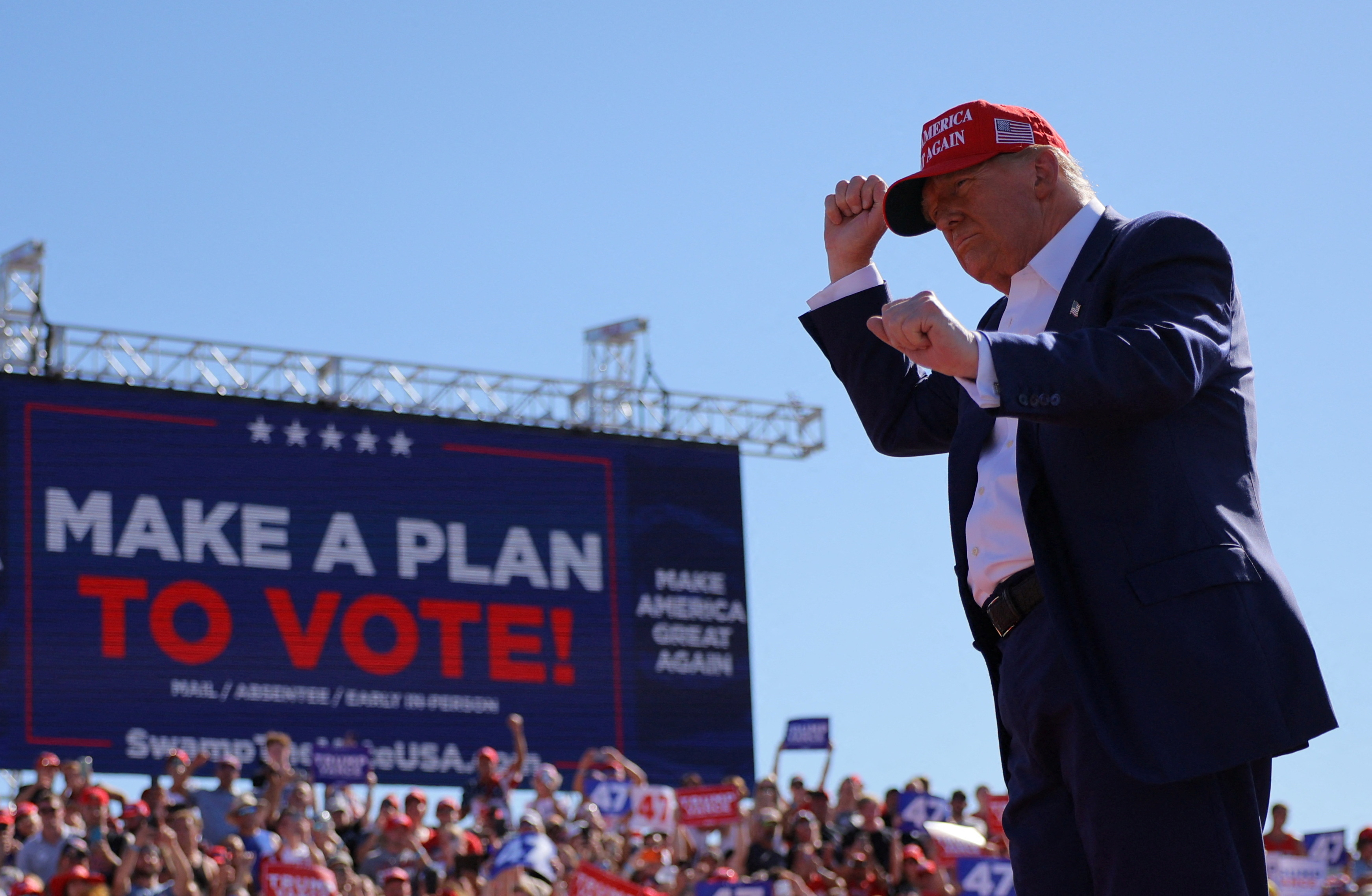 Trump campaigns in North Carolina while embattled ally Robinson stays ...