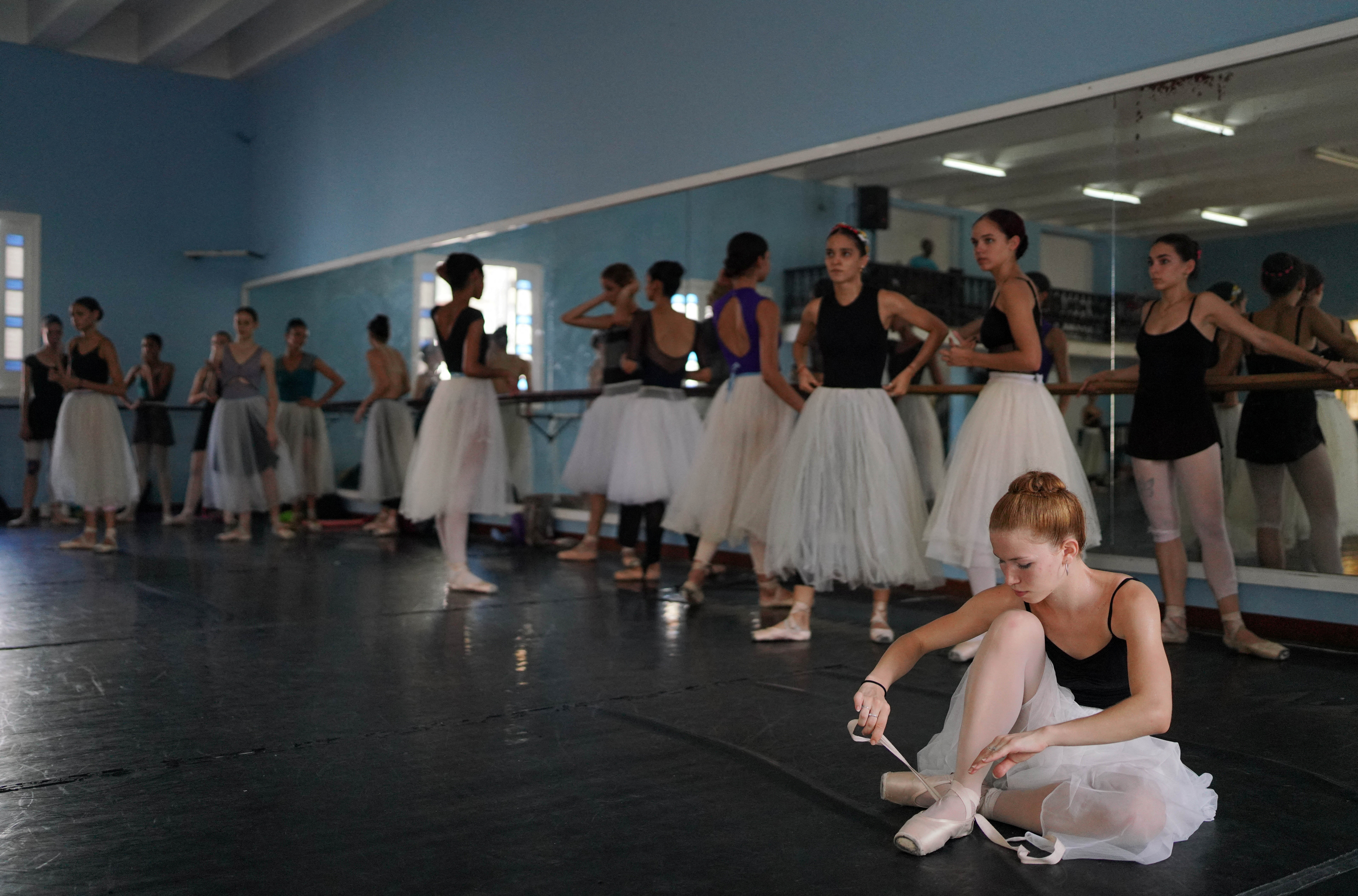 Ballet dancers get ready for a practice in Havana