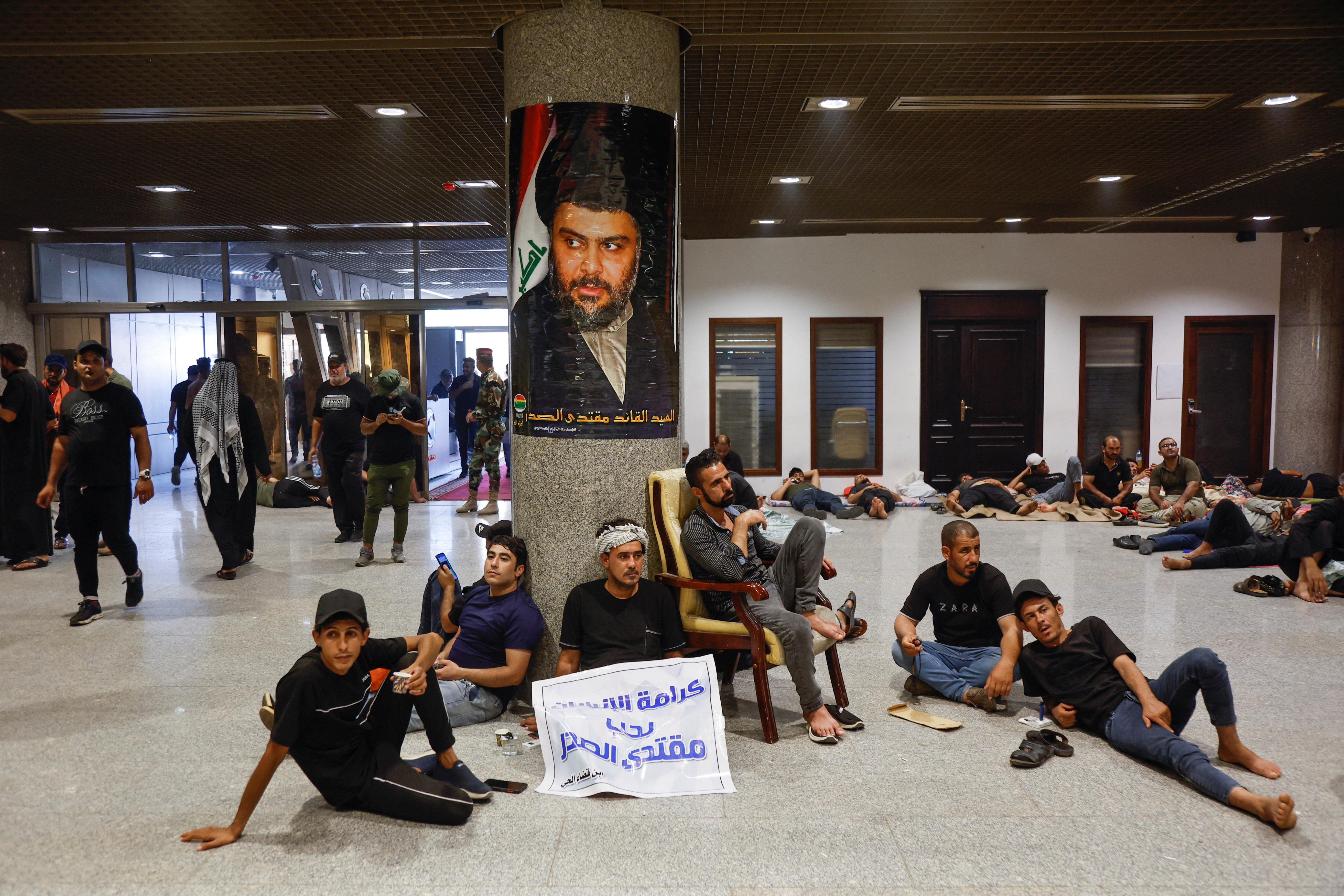 Supporters of Iraqi populist leader al-Sadr gather for a sit-in at the parliament building in Baghdad