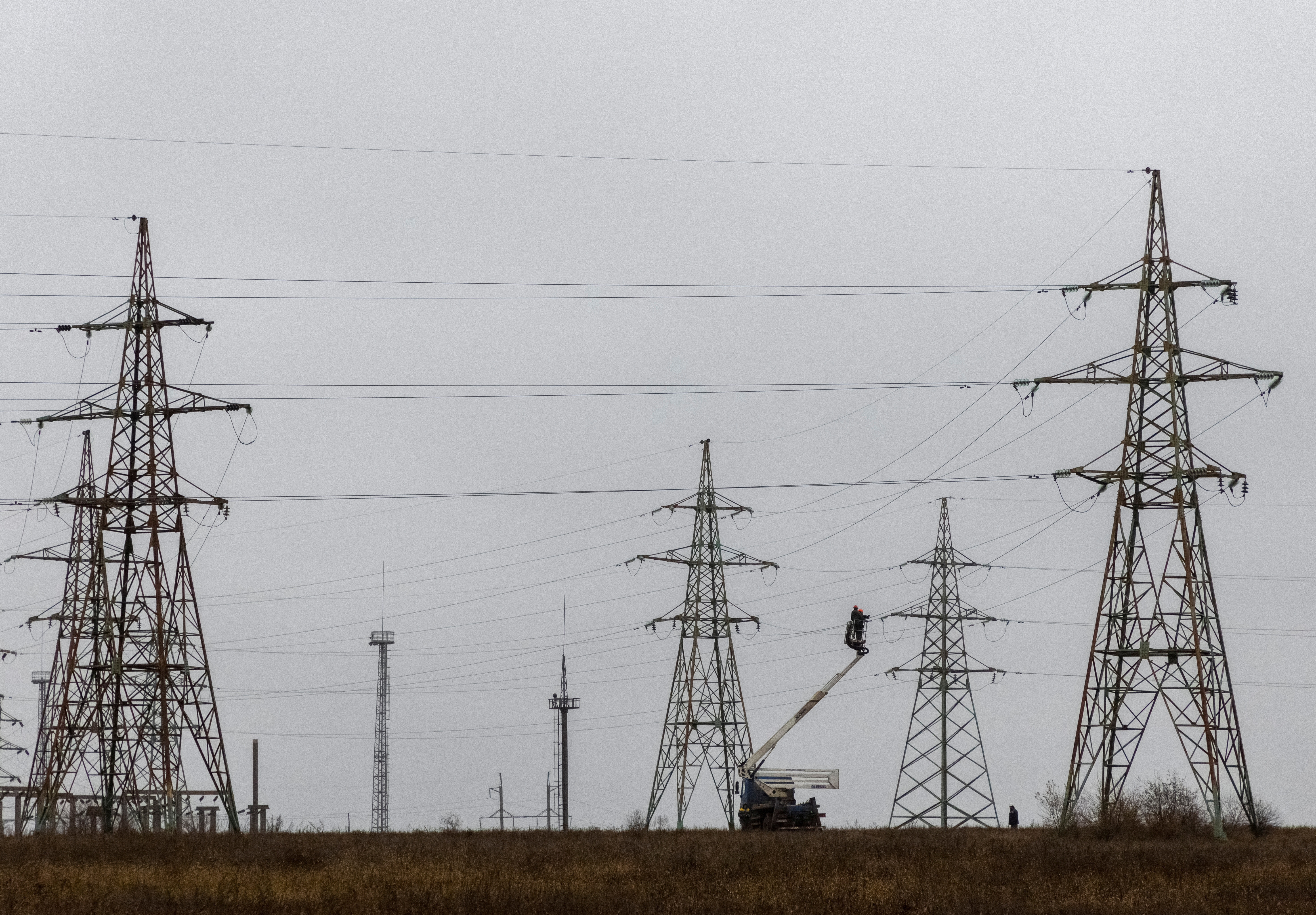 Electric power lines damaged by Russian military strikes in Kherson region