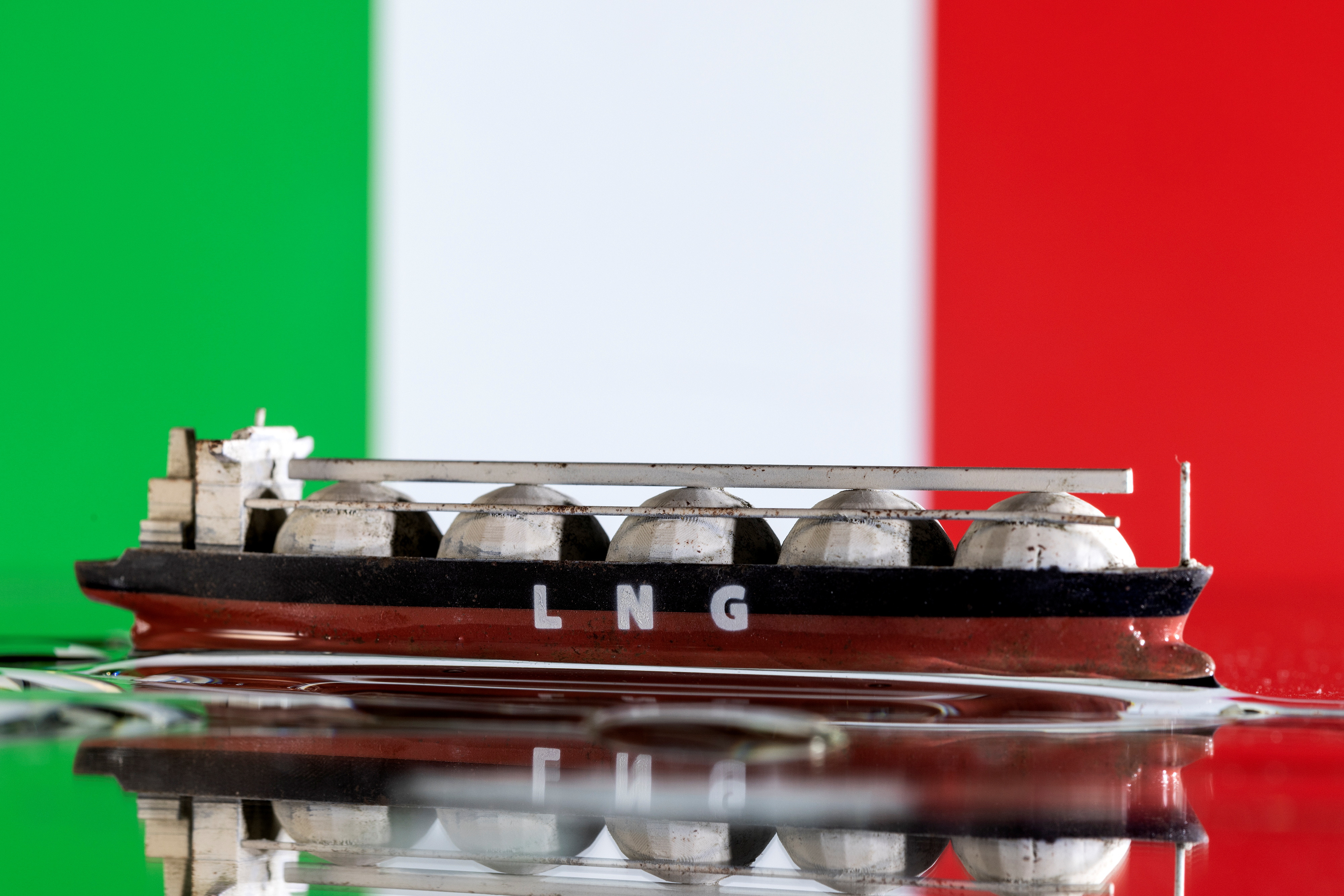 Illustration shows model of LNG tanker and Italy's flag