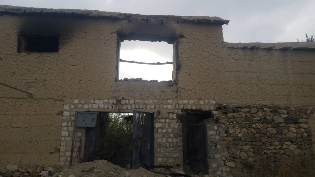 View of ruins of destroyed ancestral home of Nangarhar provincial official Ajmal Omar in Kodi Khel